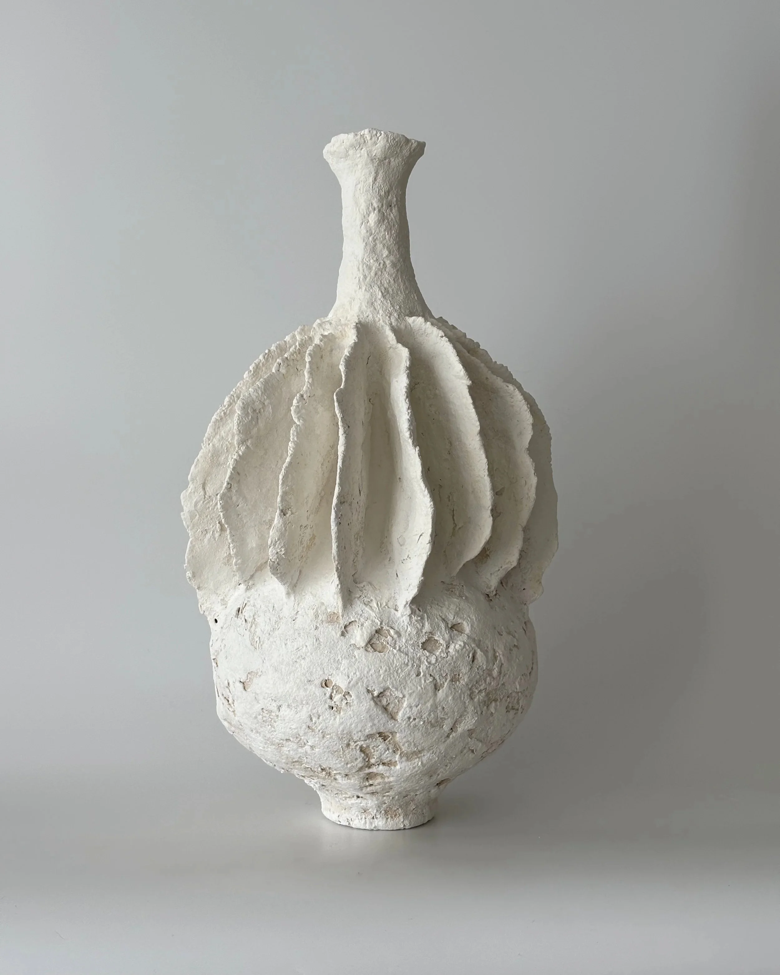 Pleated Vase N.40, handmade paper clay vase, side view. Papier Atelier London