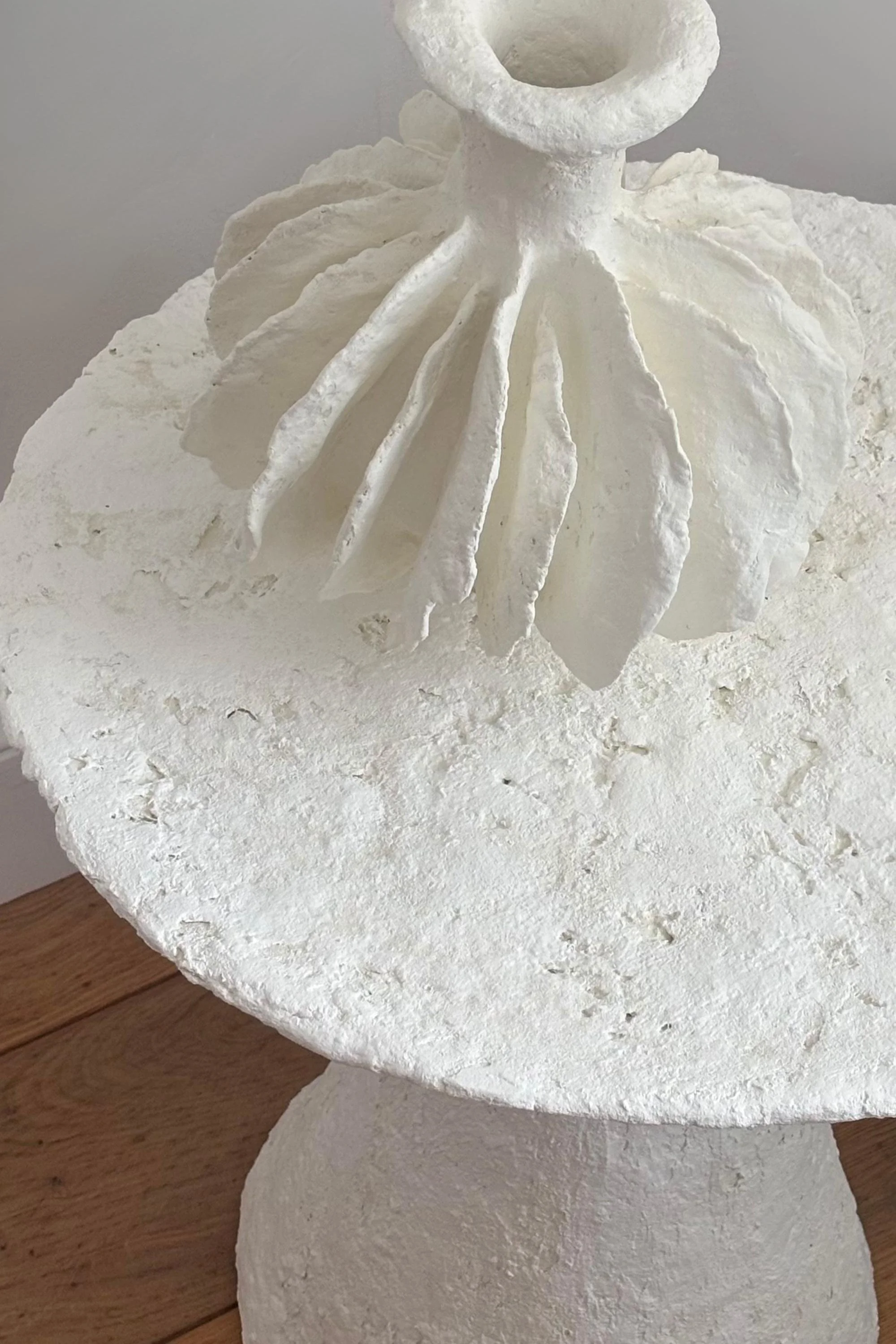 Side Table N.30, handmade white paper clay side table, disc top on a cone base, detail. Papier Atelier London