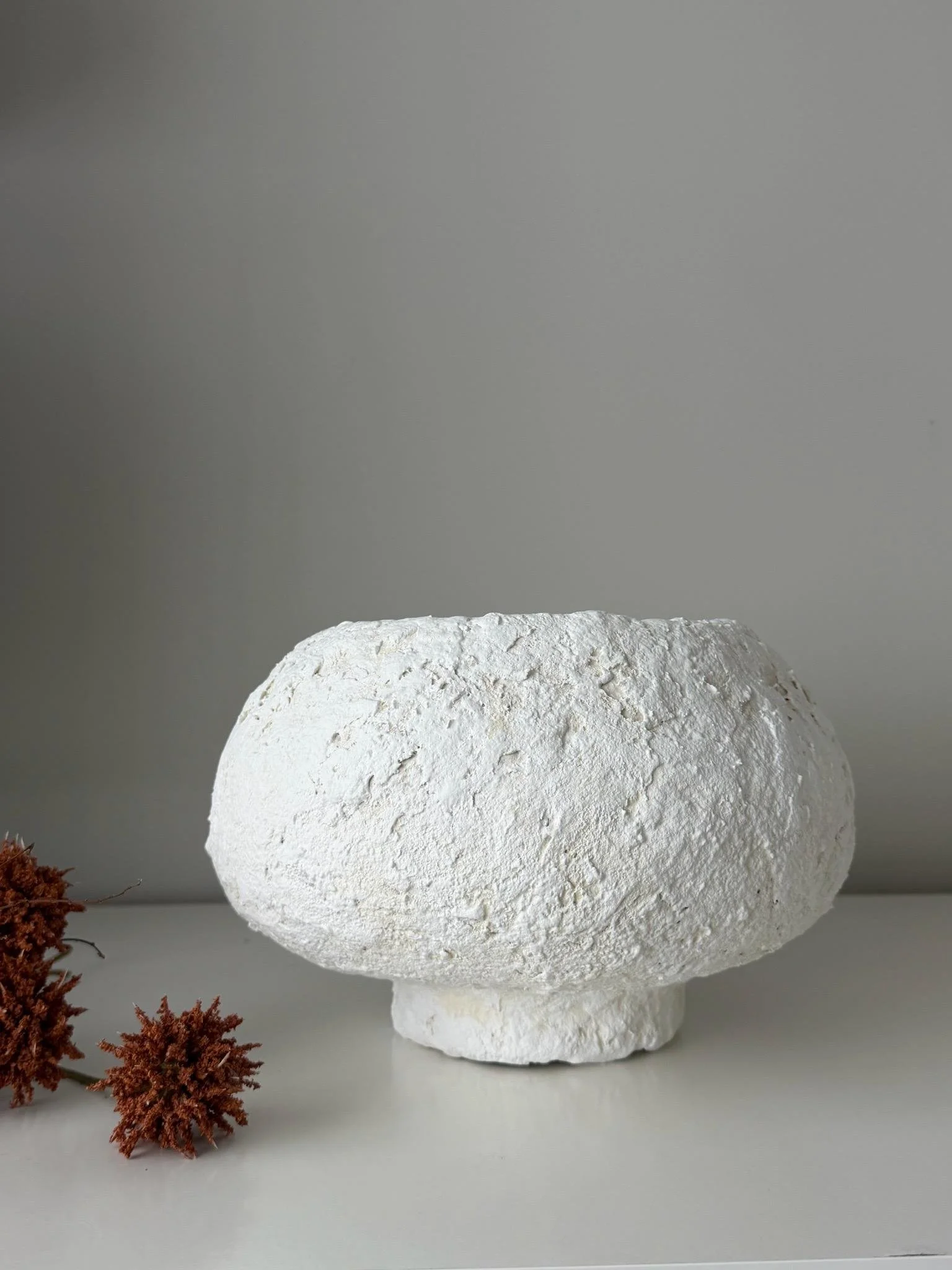 Footed Bowl N.27, handmade white paper clay bowl, on a low foot, front view. Papier Atelier London