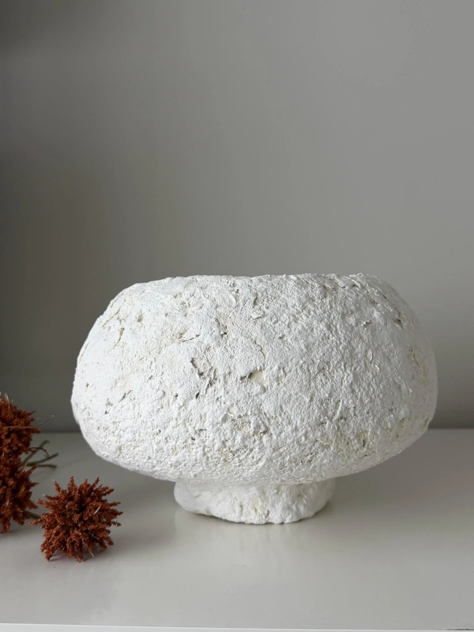 Footed Bowl N.27, handmade white paper clay bowl, on a low foot, another angle. Papier Atelier London