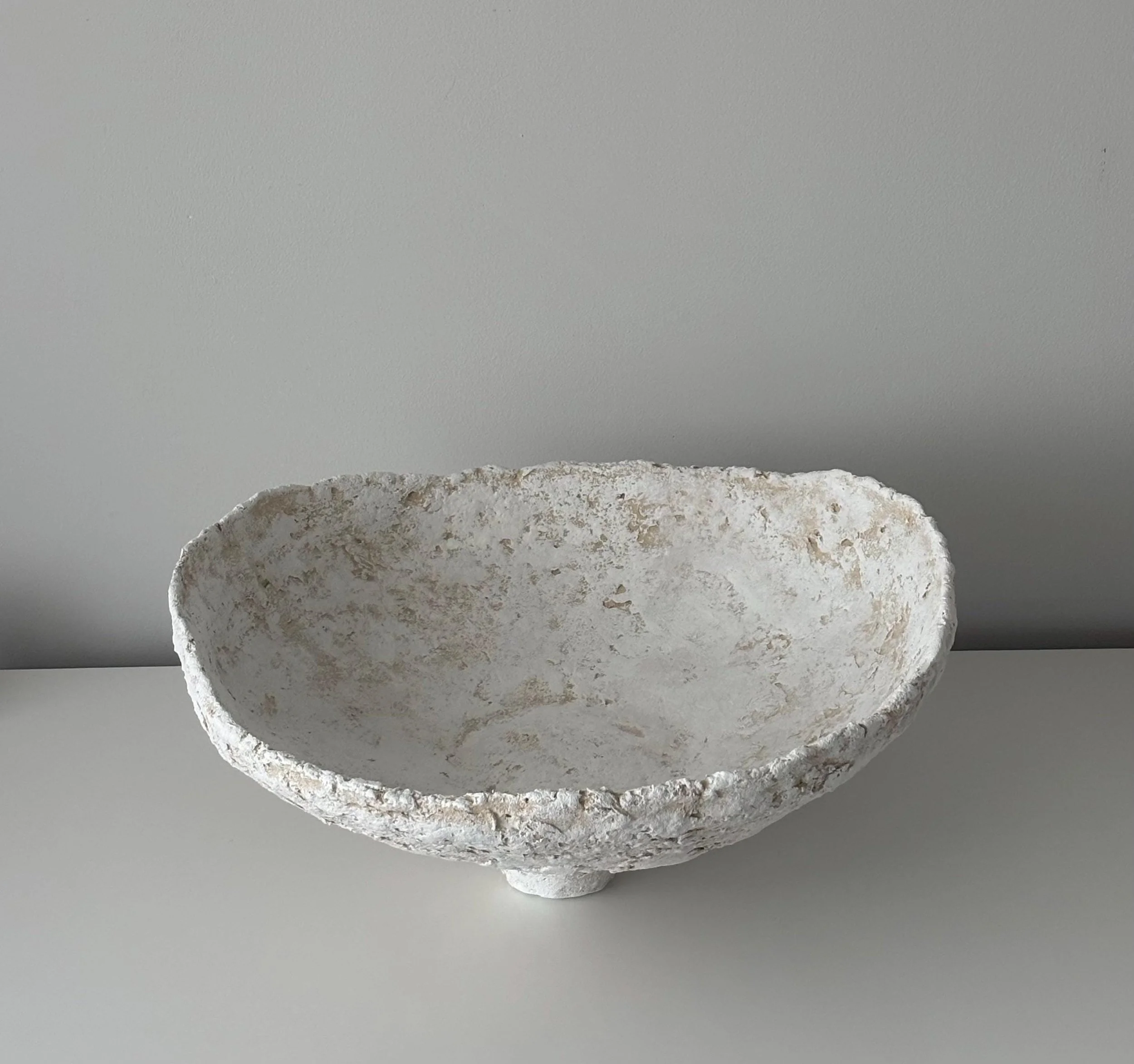 Wide Bowl N.32, handmade white paper clay bowl, on a narrow foot, detail. Papier Atelier London