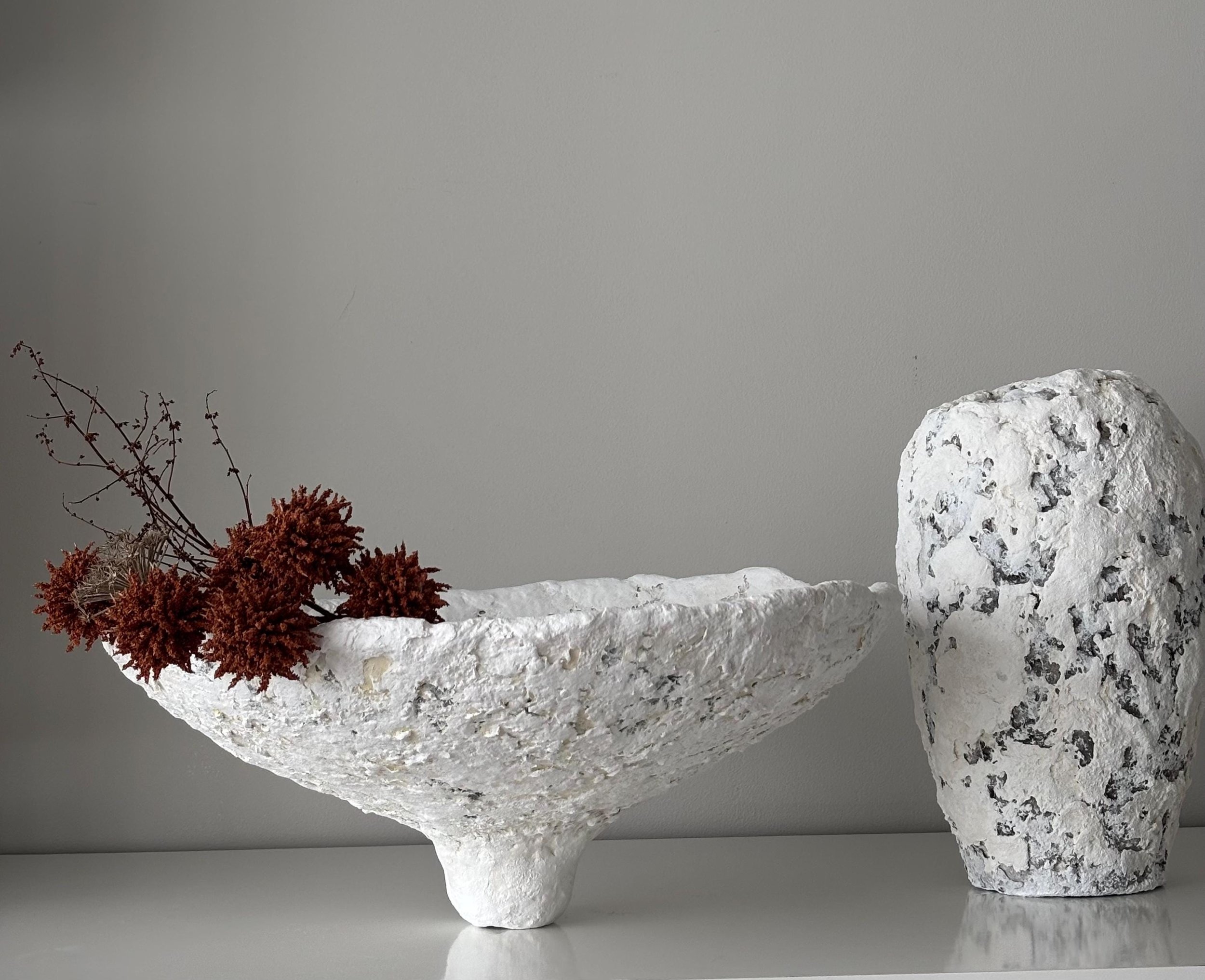 Large Bowl N.34, handmade large white paper clay bowl, on a slender foot, side view. Papier Atelier London