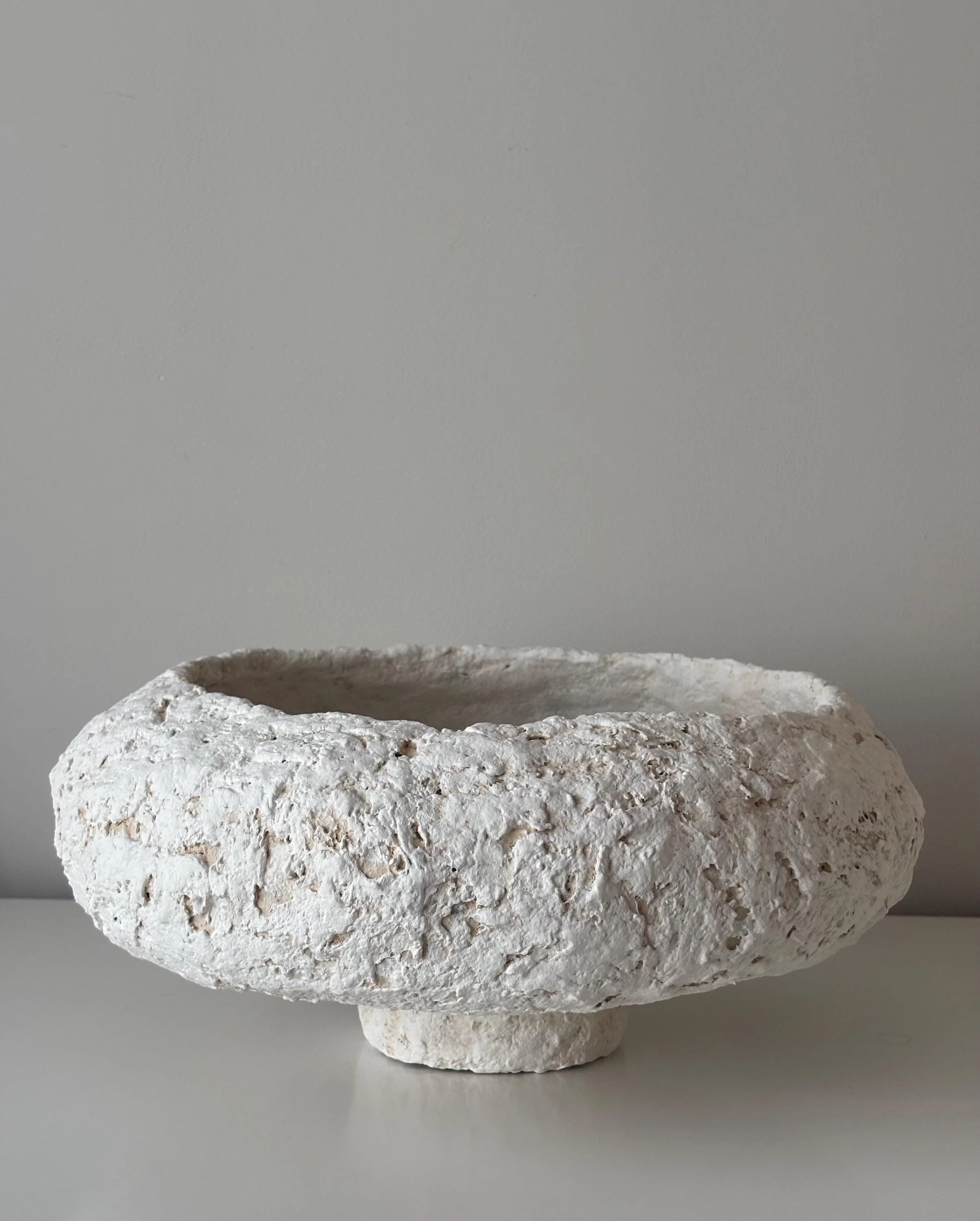 Textured Bowl N.37, handmade white paper clay bowl, heavily textured rim, front view. Papier Atelier London
