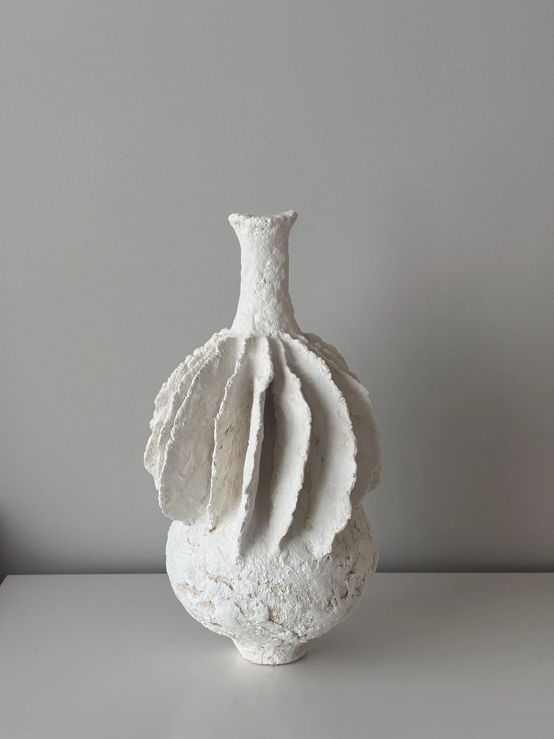 Pleated Vase N.40, handmade tall white pleated paper clay vase, folded fins, detail. Papier Atelier London