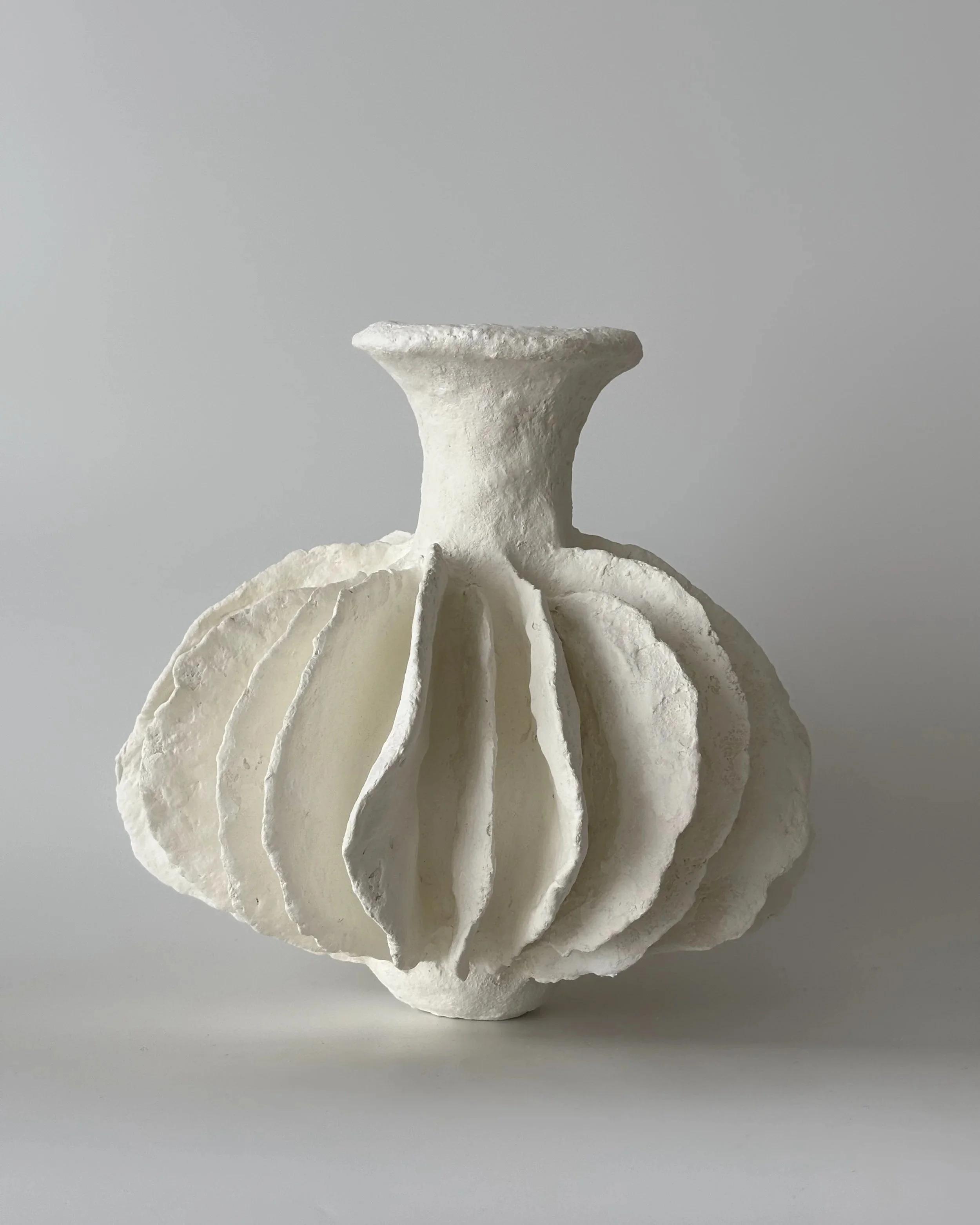 Pleated Vase N.28, handmade paper clay vase, front view. Papier Atelier London