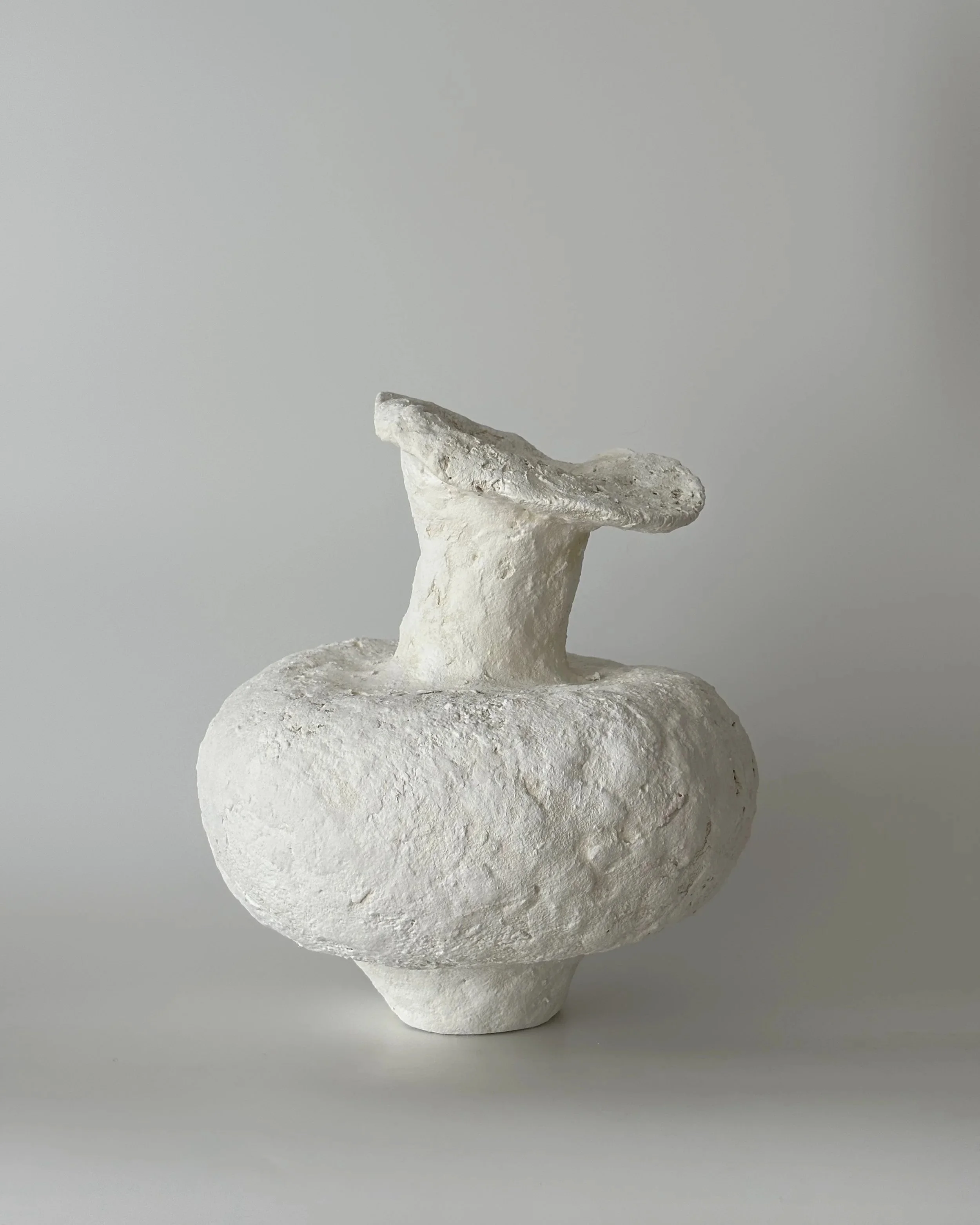 Asymmetric Vase N.48, handmade paper clay vase, view from above. Papier Atelier London