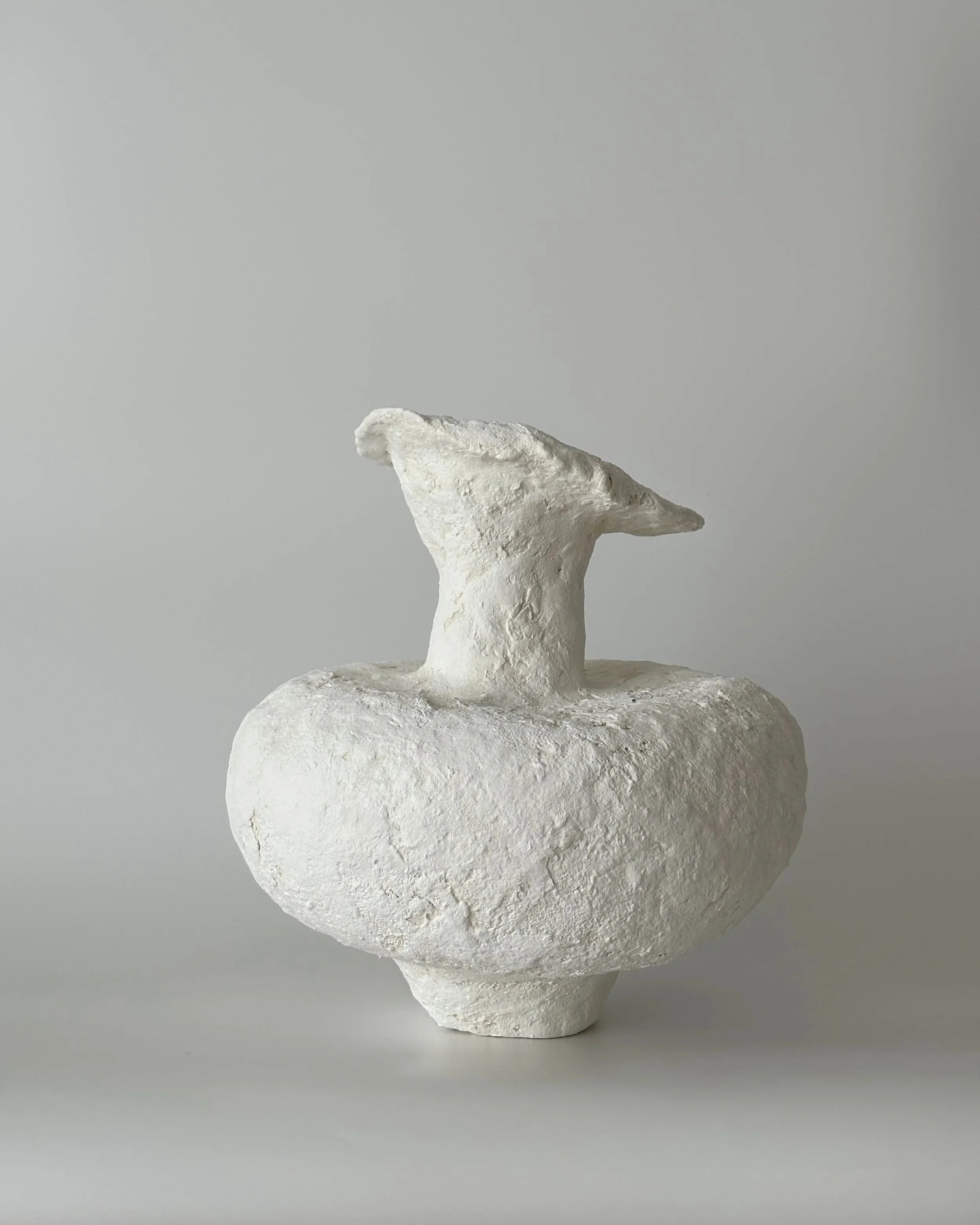 Asymmetric Vase N.48, handmade paper clay vase, side view. Papier Atelier London