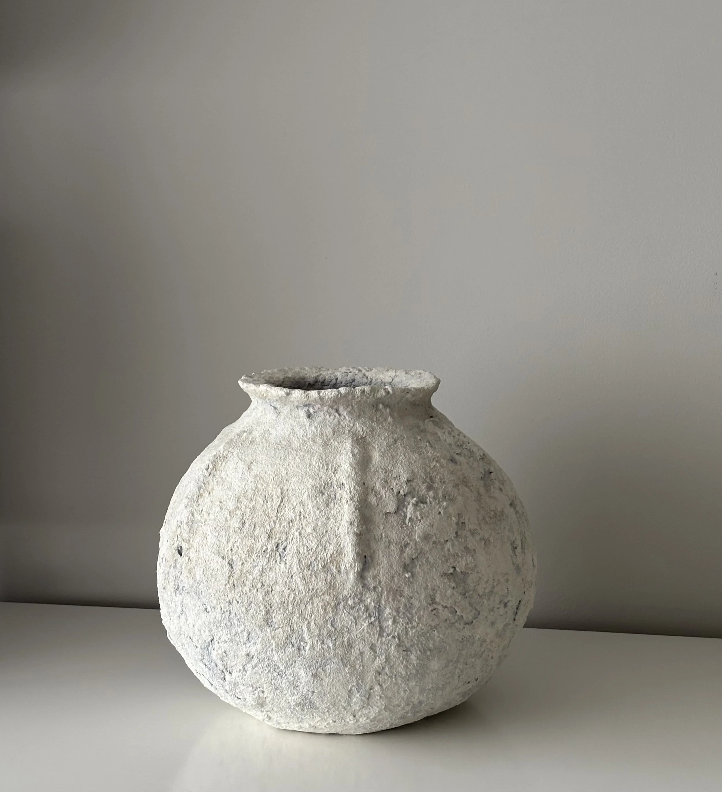 Close-up detail of Textured Vessel N.11 surface texture, showing sculptural paper clay imperfections and Wabi-Sabi character, unique handcrafted pottery