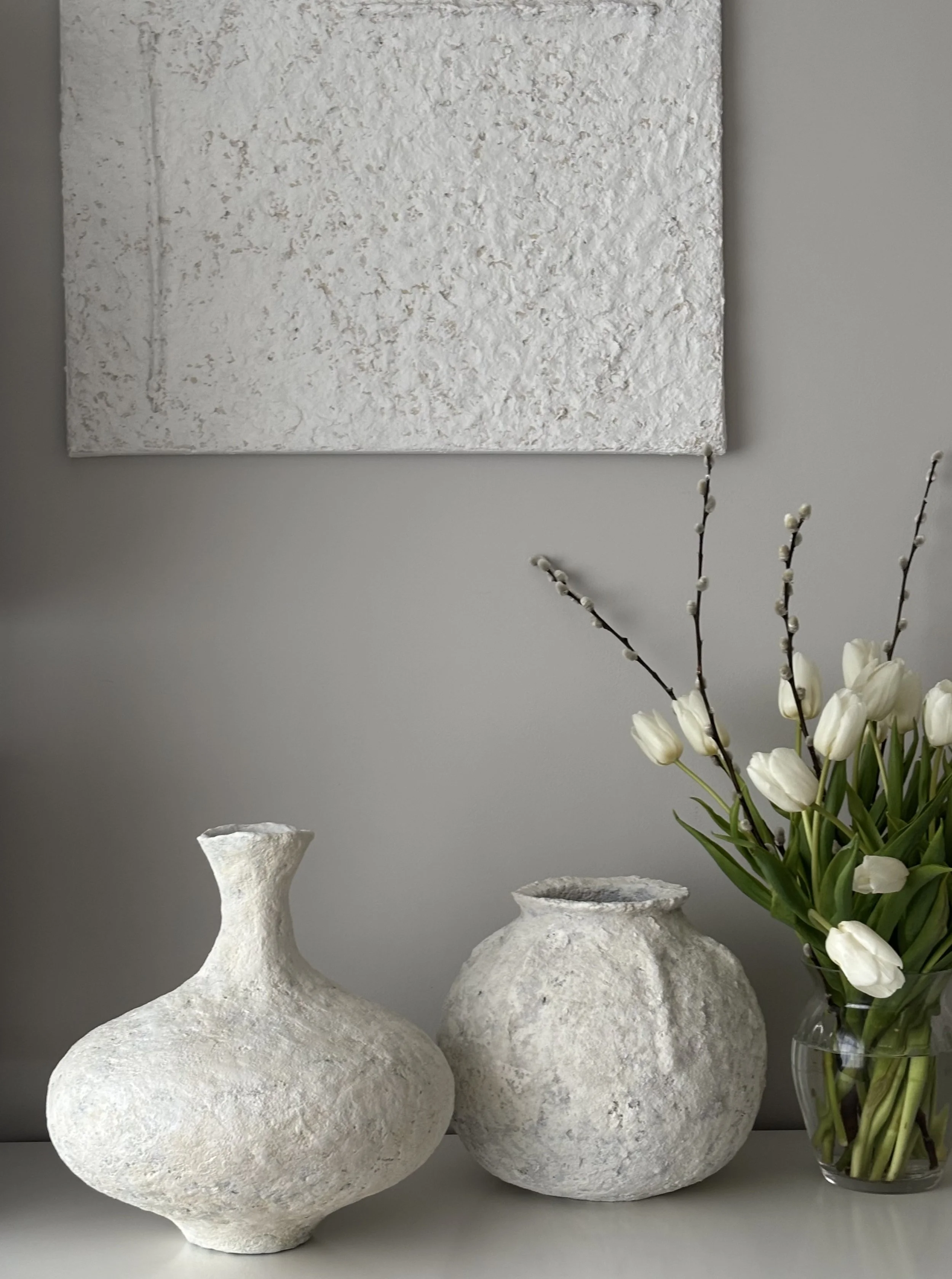Side profile of Textured Vessel N.11 in Wabi-Sabi inspired paper clay, showing the sculptural silhouette and textured surface, London atelier