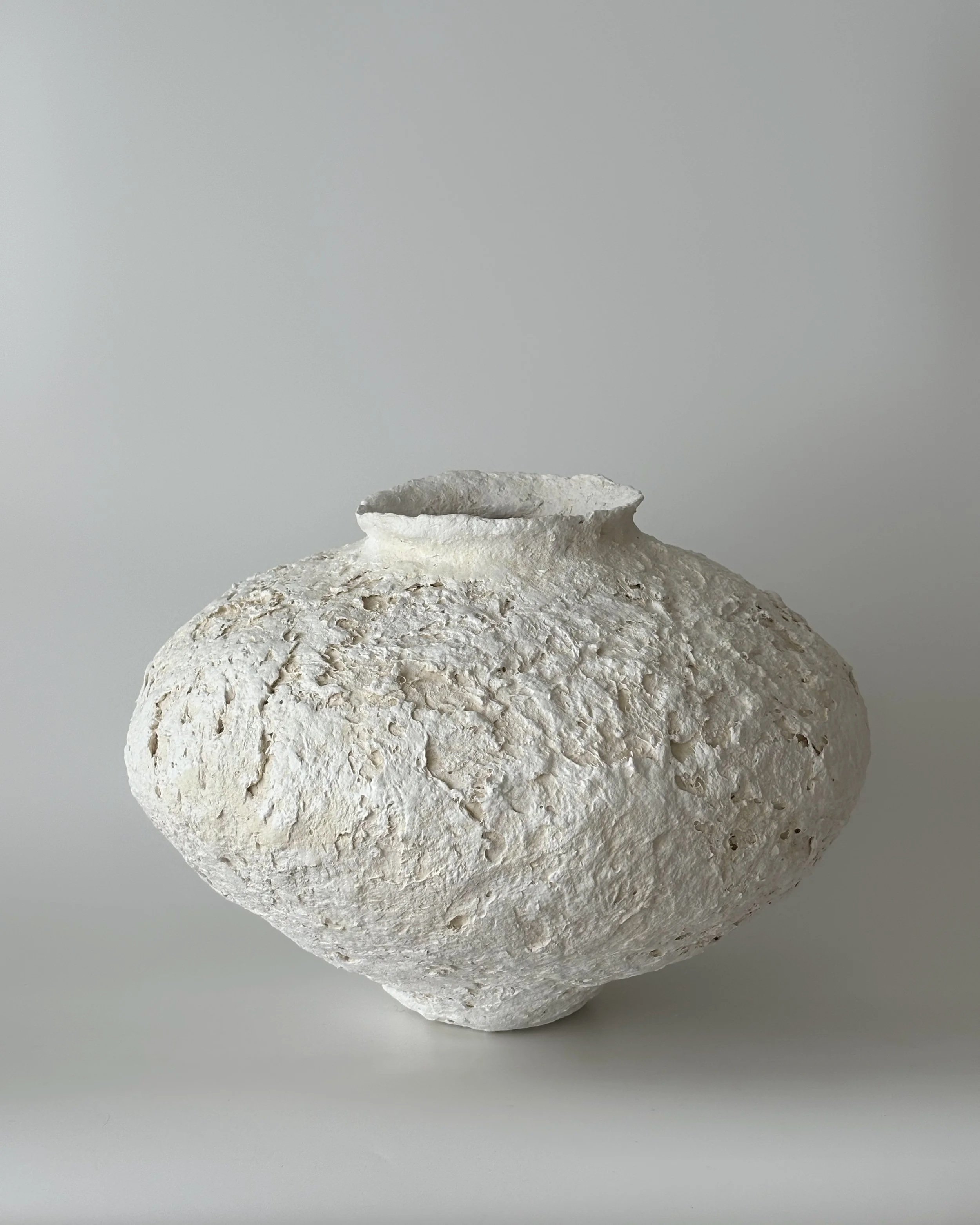 Textured Vessel N.38, handmade paper clay vessel, side view. Papier Atelier London