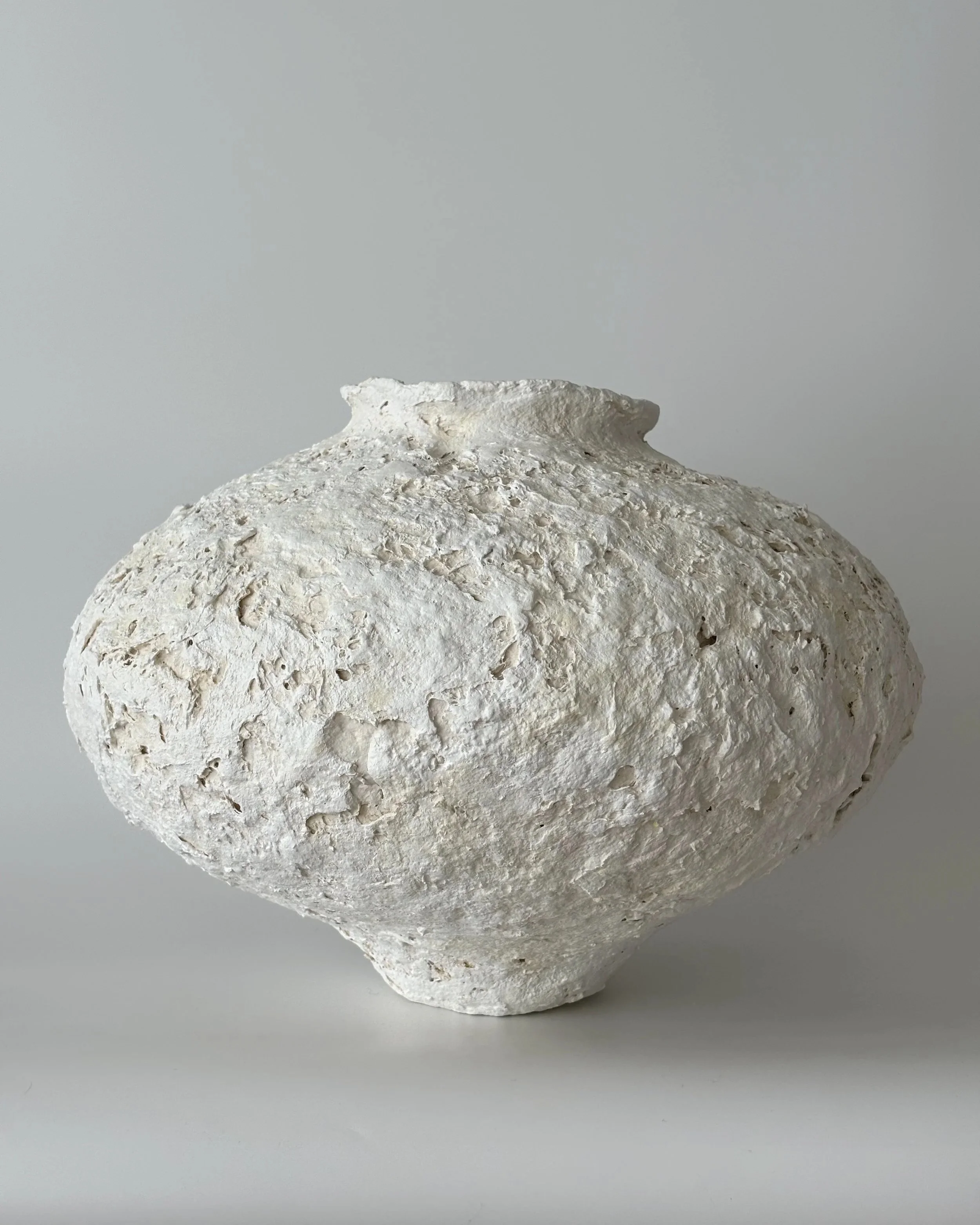 Textured Vessel N.38, handmade paper clay vessel, front view. Papier Atelier London