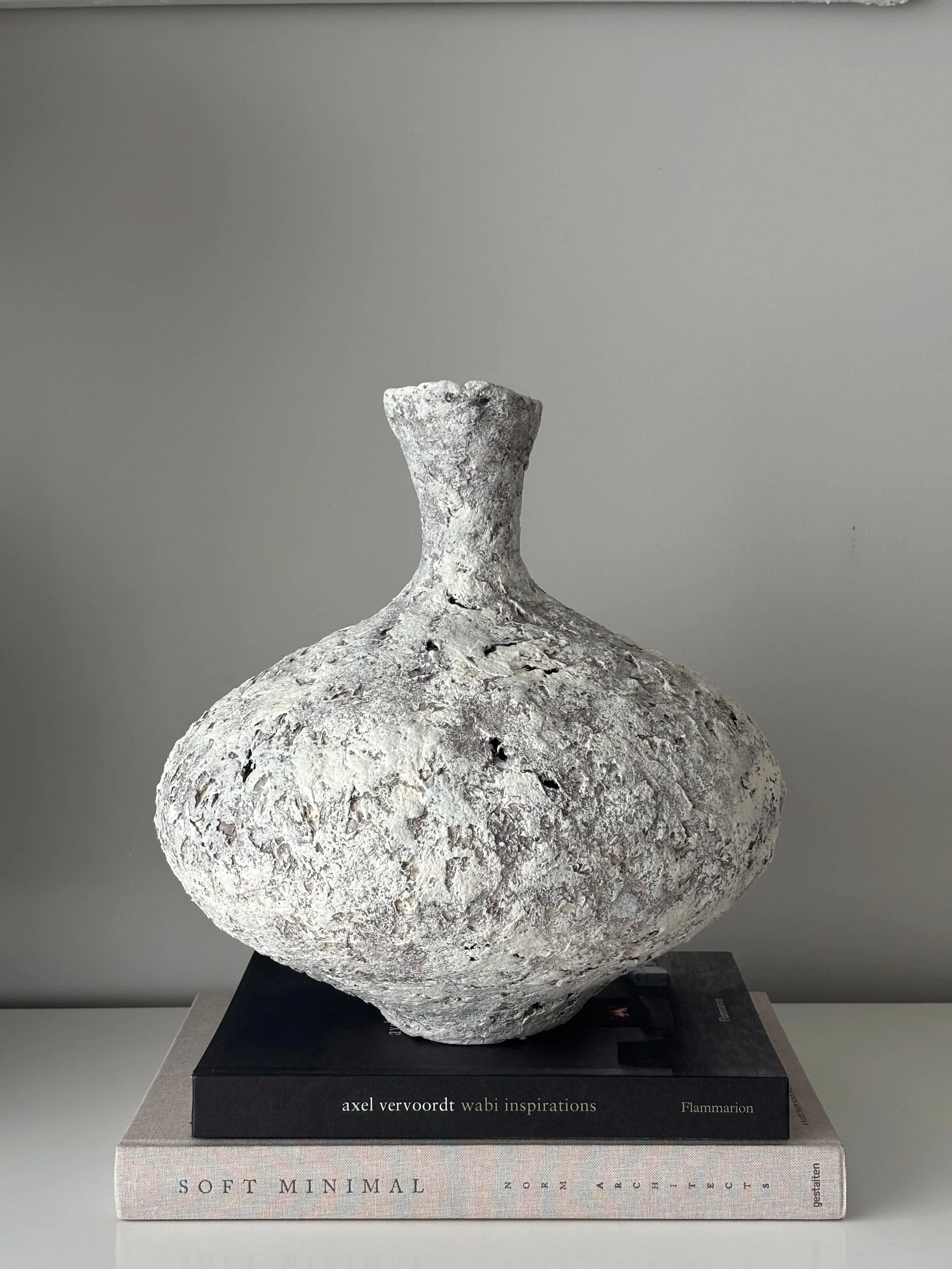 Wabi Sabi Vase N.11 shown in context, off-white Wabi-Sabi inspired paper clay vase complementing a minimalist interior aesthetic