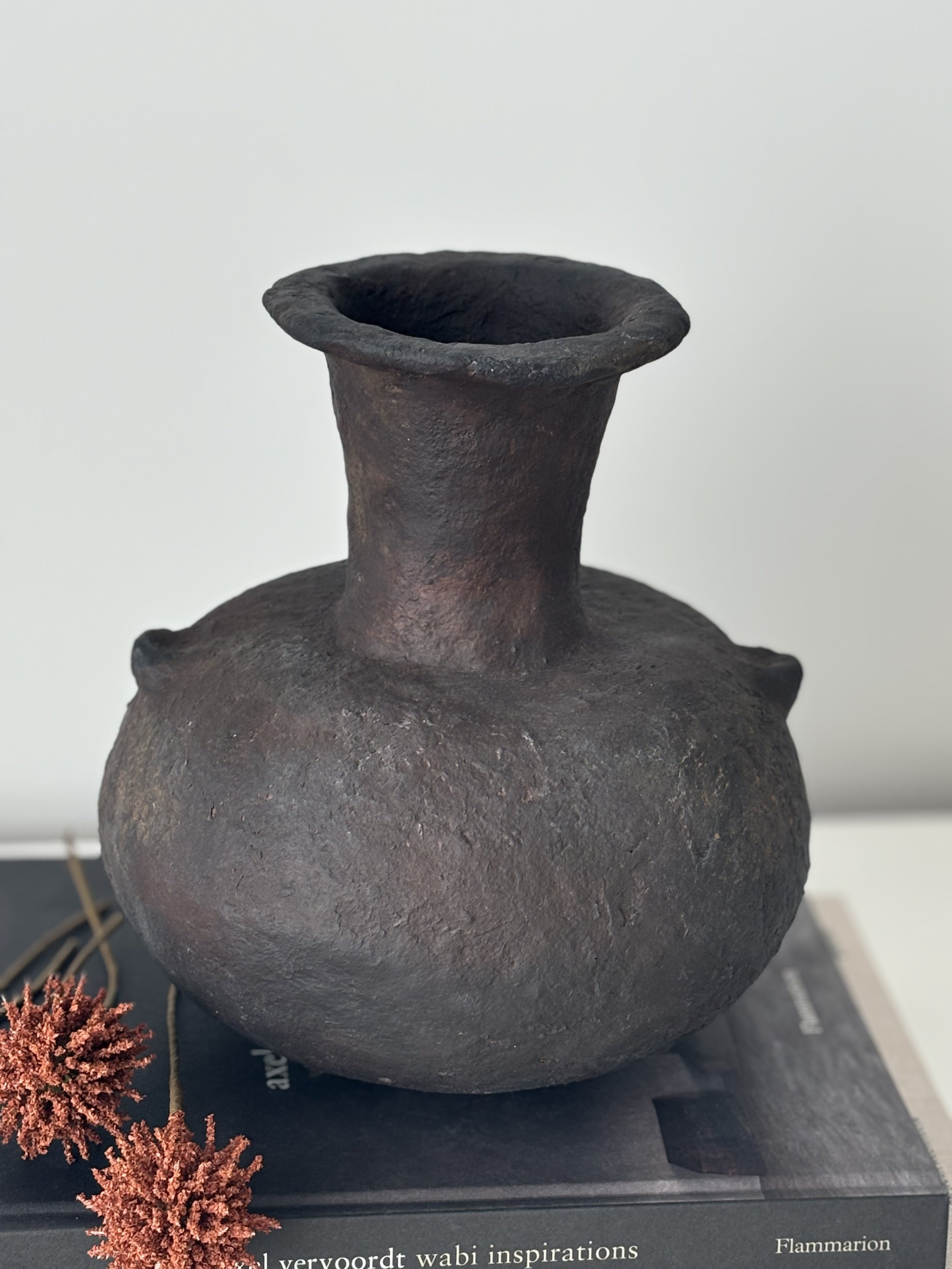 Sculptural Vase N.18, white paper clay vase viewed from an alternate angle highlighting asymmetrical shape, from Papier Atelier London