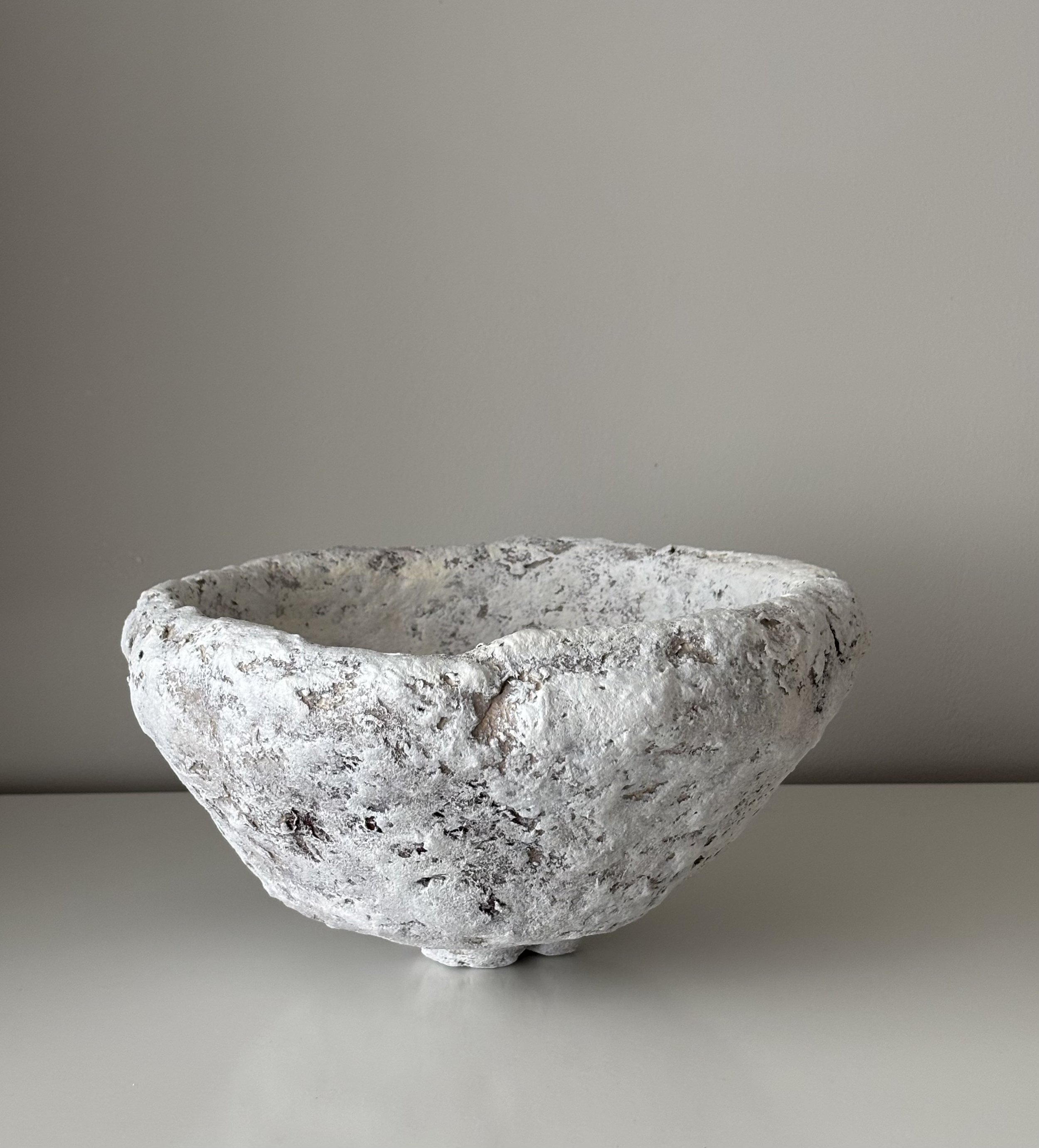Side profile of Textured Sculptural Bowl N.51 in Wabi-Sabi inspired paper clay, showing the sculptural silhouette and textured surface, London atelier