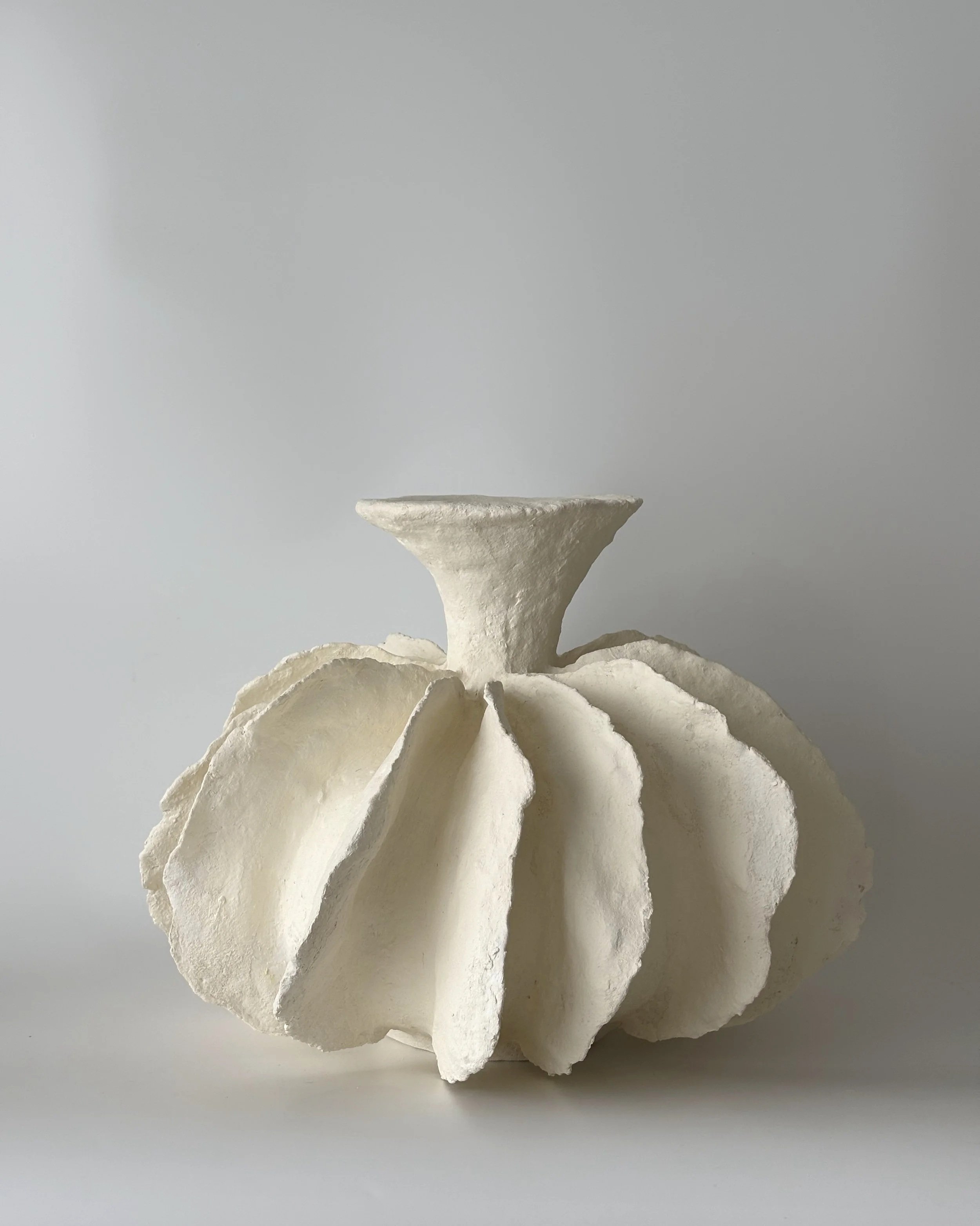 Pleated Vase N.12, handmade paper clay vase, front view. Papier Atelier London