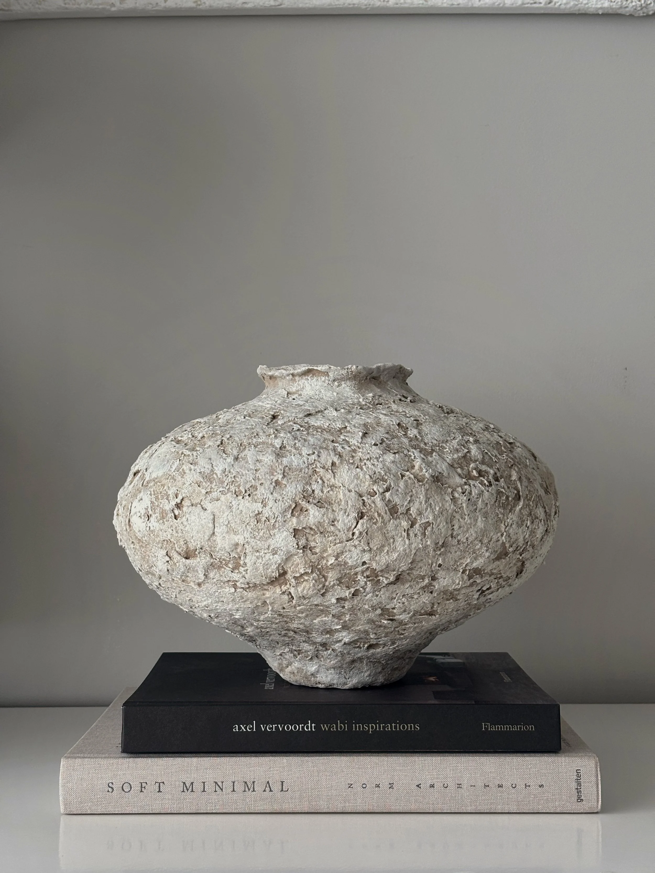 Side profile of Sculptural Vessel N.20 in Wabi-Sabi inspired paper clay, showing the sculptural silhouette and textured surface, London atelier
