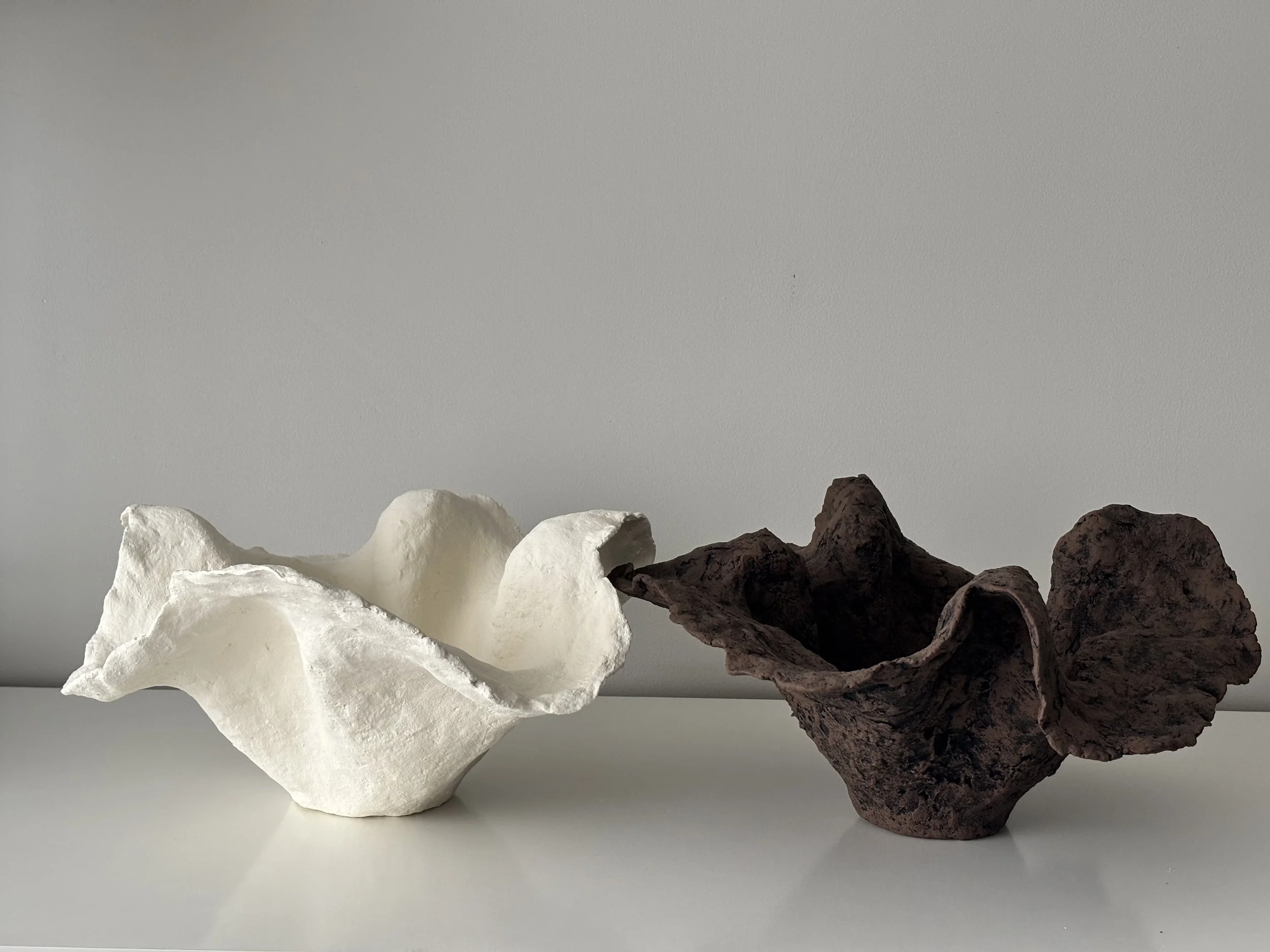 Handkerchief Bowl N.51, dark brown & off-white paper clay bowl viewed from an alternate angle highlighting asymmetrical shape, from Papier Atelier London