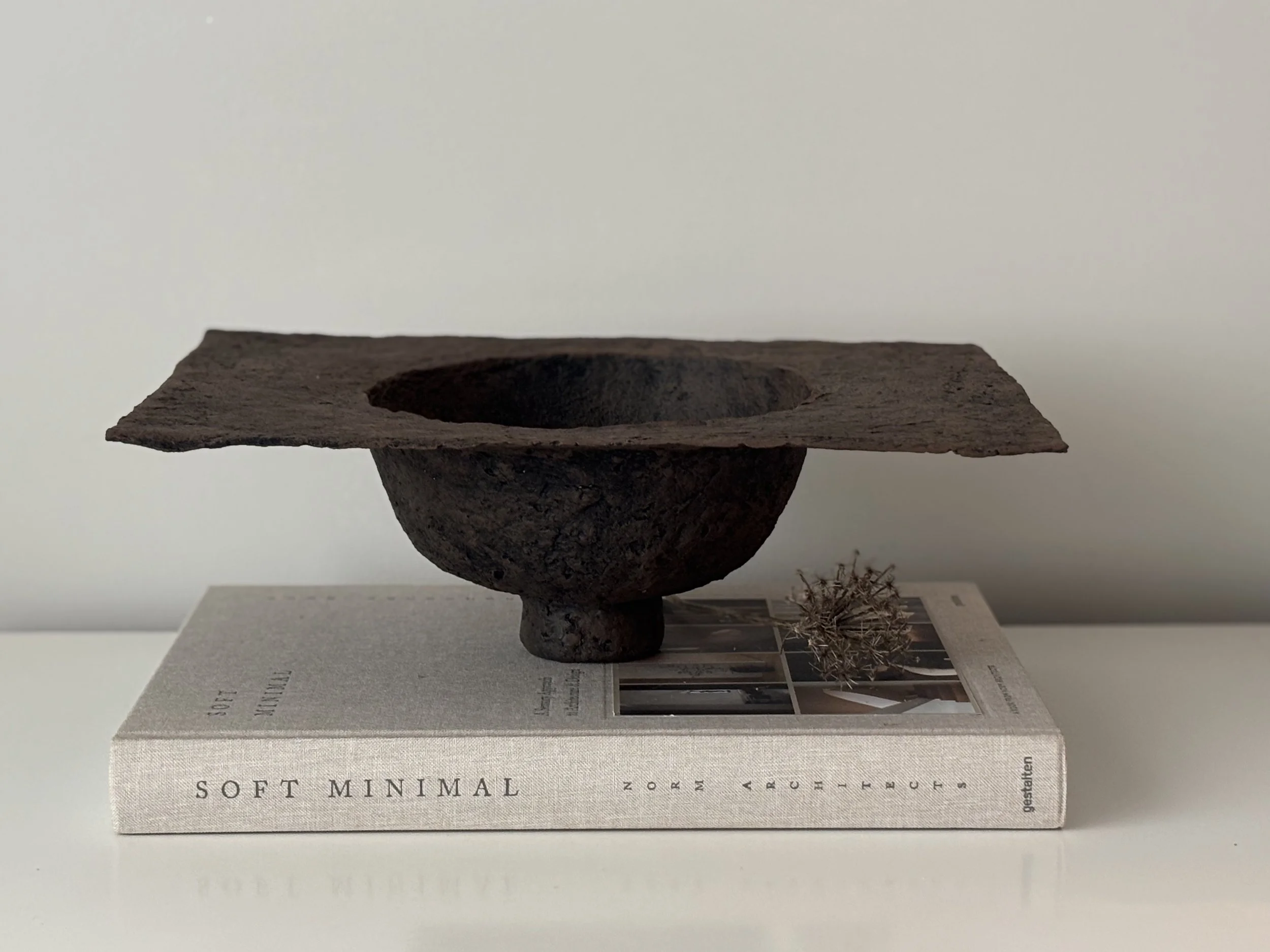 Side profile of Wabi Sabi Rectangular Bowl N.7 in Wabi-Sabi inspired paper clay, showing the sculptural silhouette and textured surface, London atelier