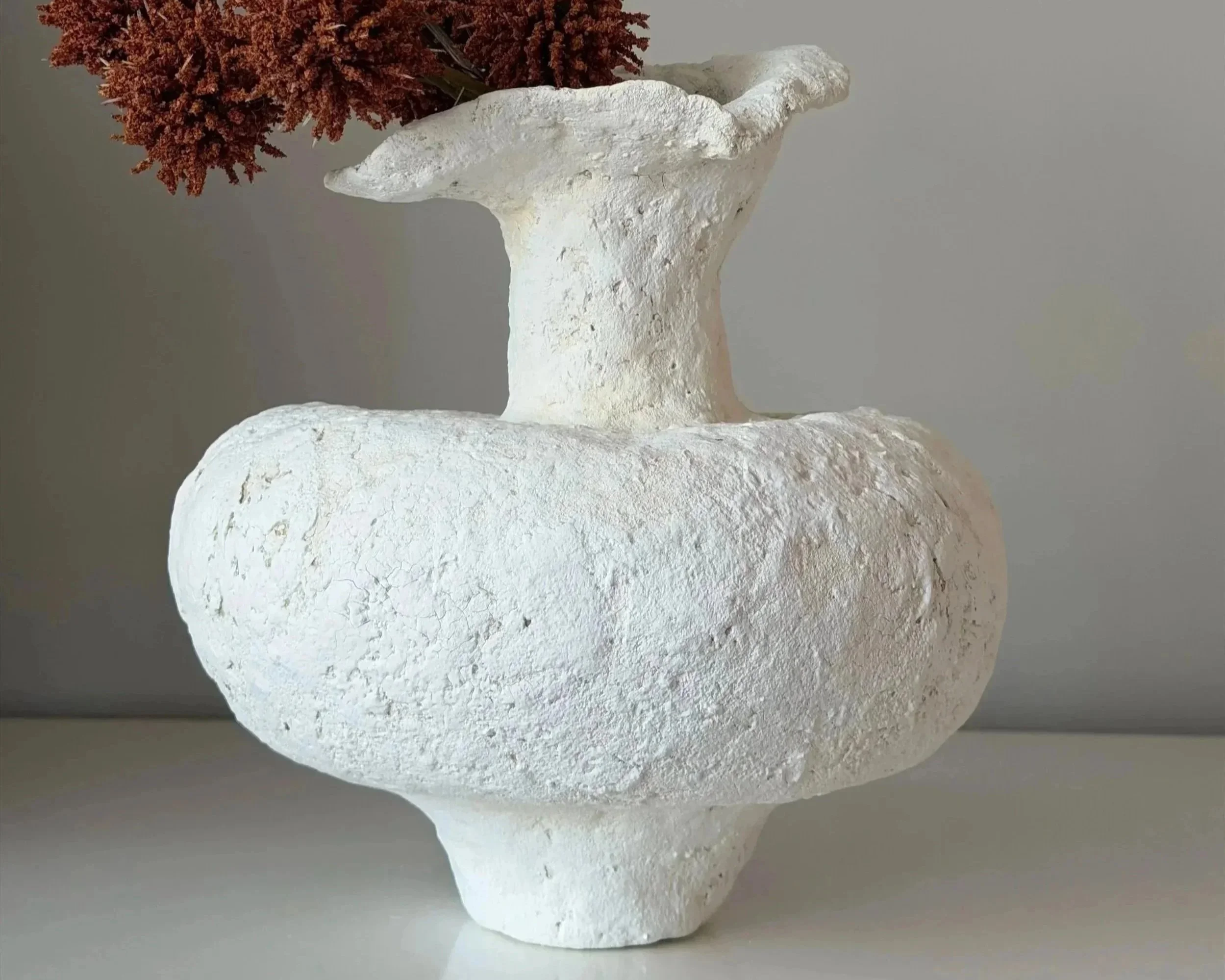 Asymmetric Vessel N.48 — Front View White paper clay vessel showing asymmetric neck and cracked surface, handmade by Papier Atelier London