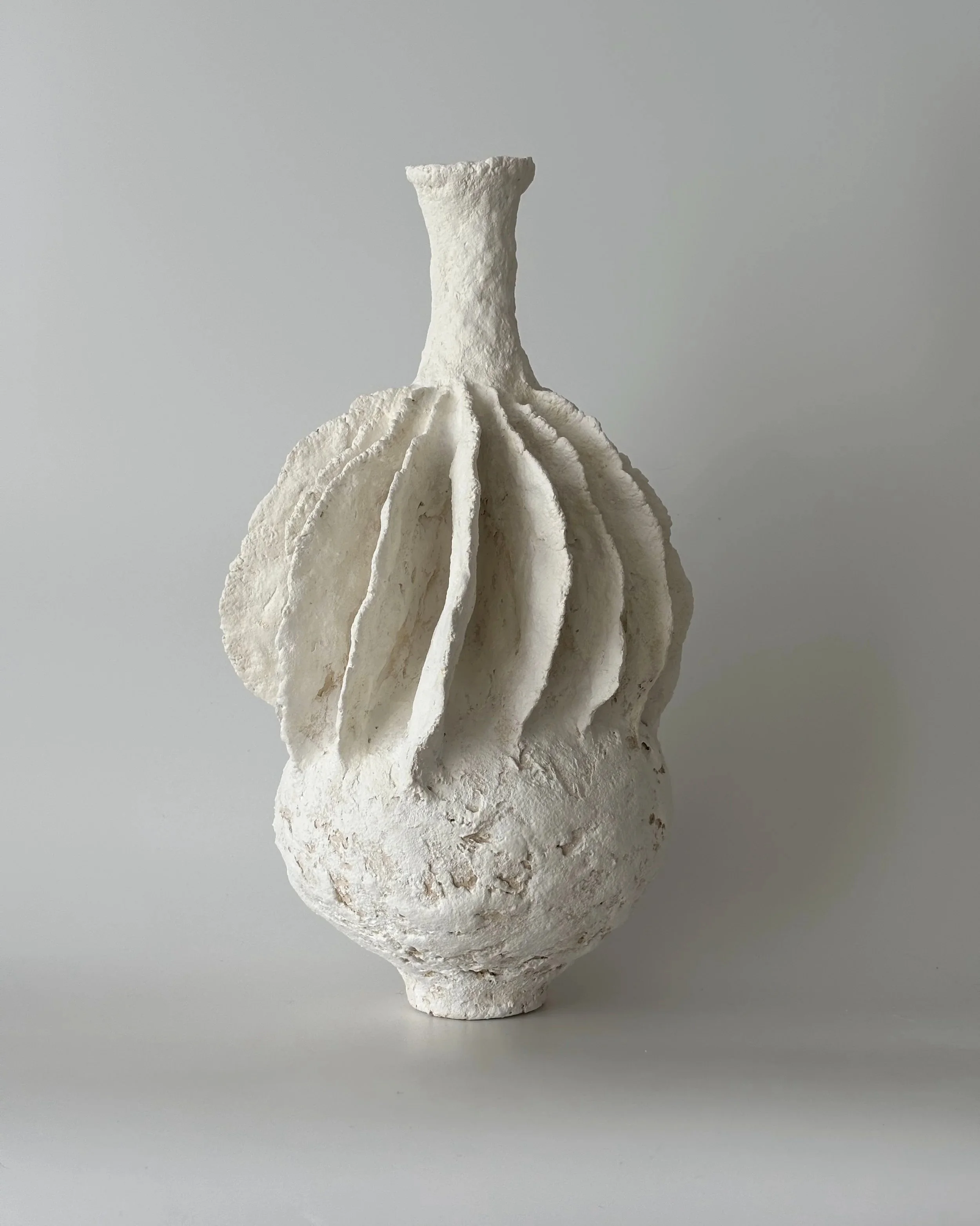 Pleated Vase N.40, handmade paper clay vase, front view. Papier Atelier London