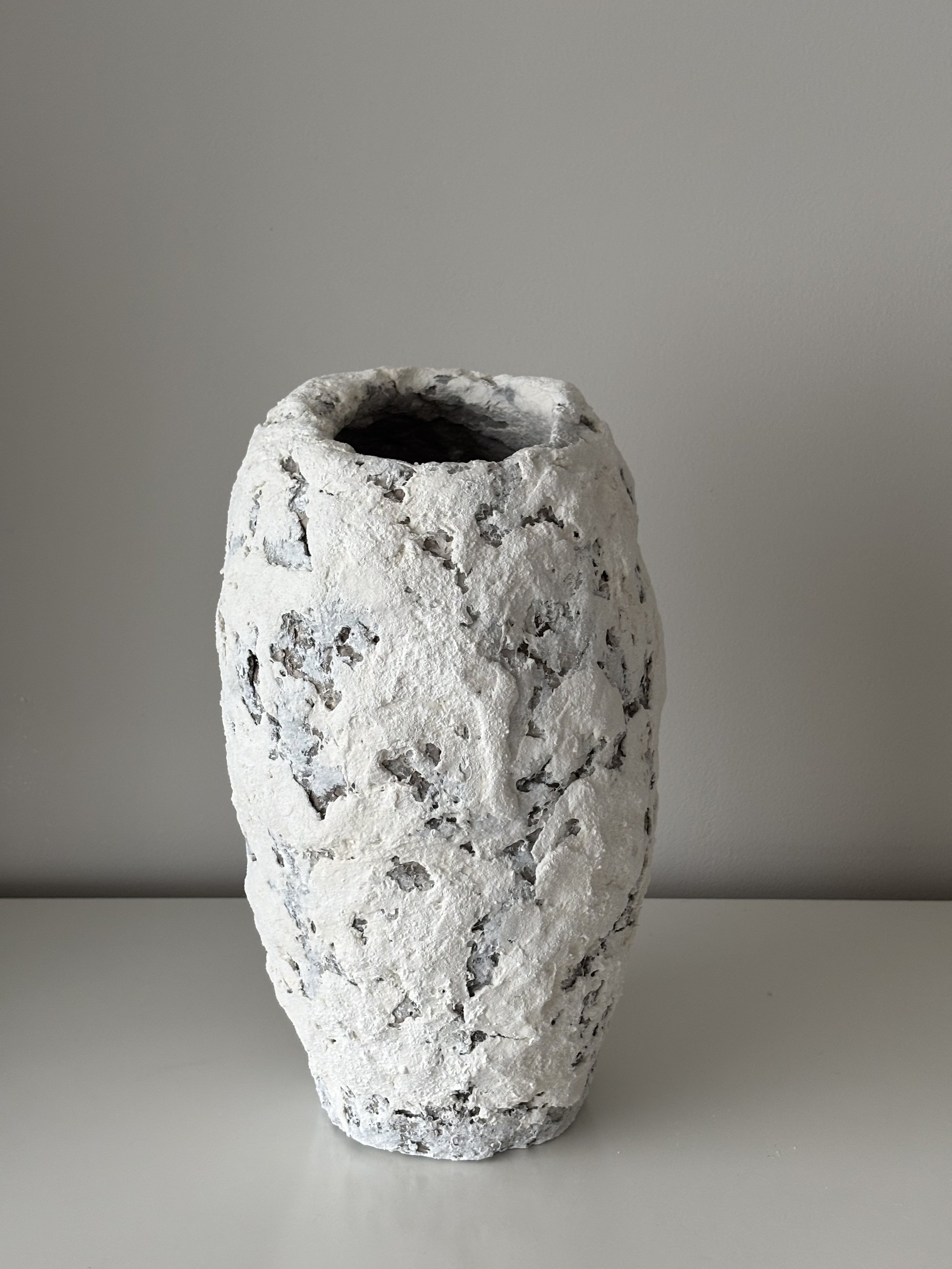 Close-up detail of Textured White Vase N.41 surface texture, showing sculptural paper clay imperfections and Wabi-Sabi character, unique handcrafted pottery