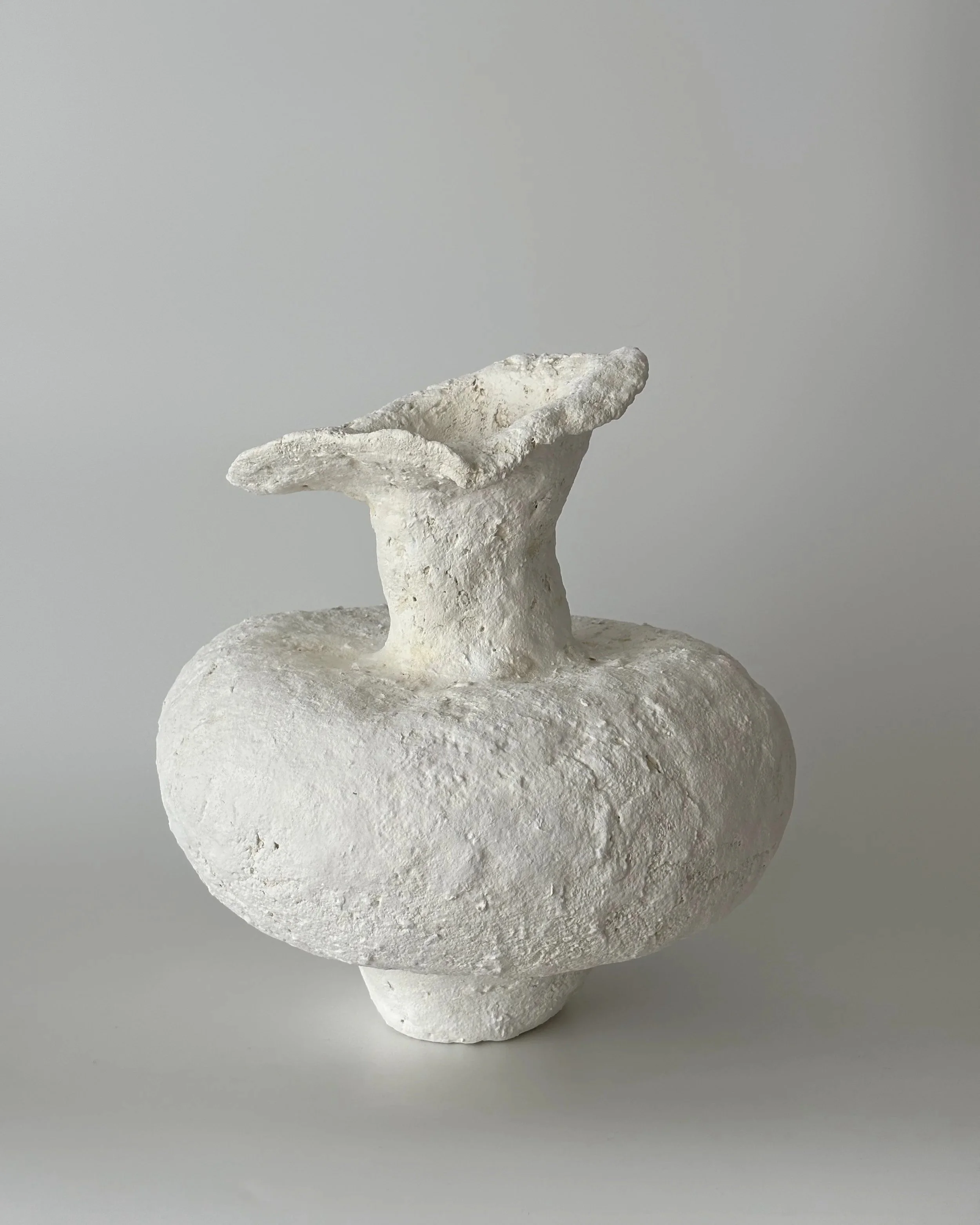 Asymmetric Vase N.48, handmade paper clay vase, front view. Papier Atelier London