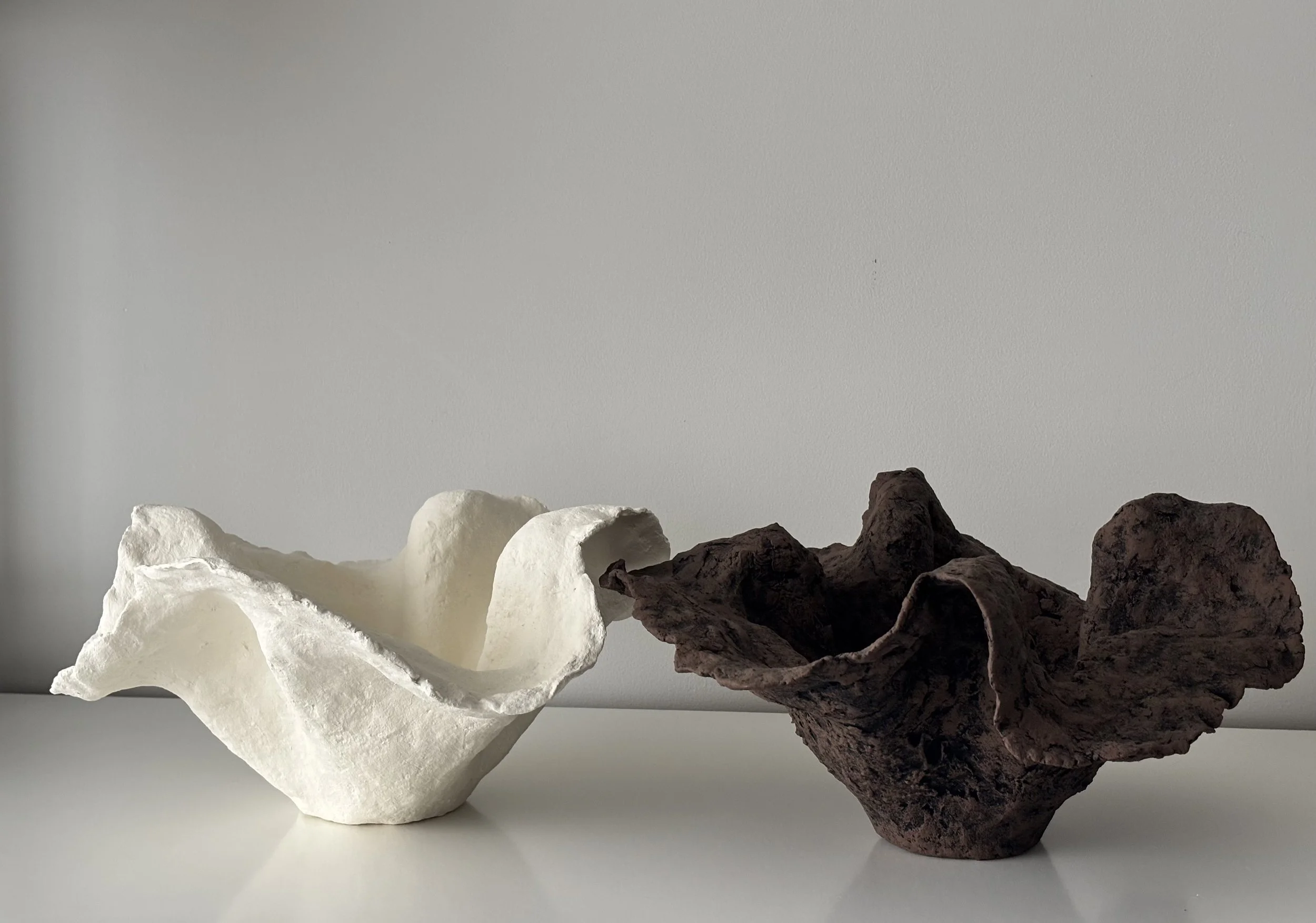 Rear view of Handkerchief White Bowl N.33 in white Wabi-Sabi inspired paper clay, showing organic asymmetry from behind, London atelier