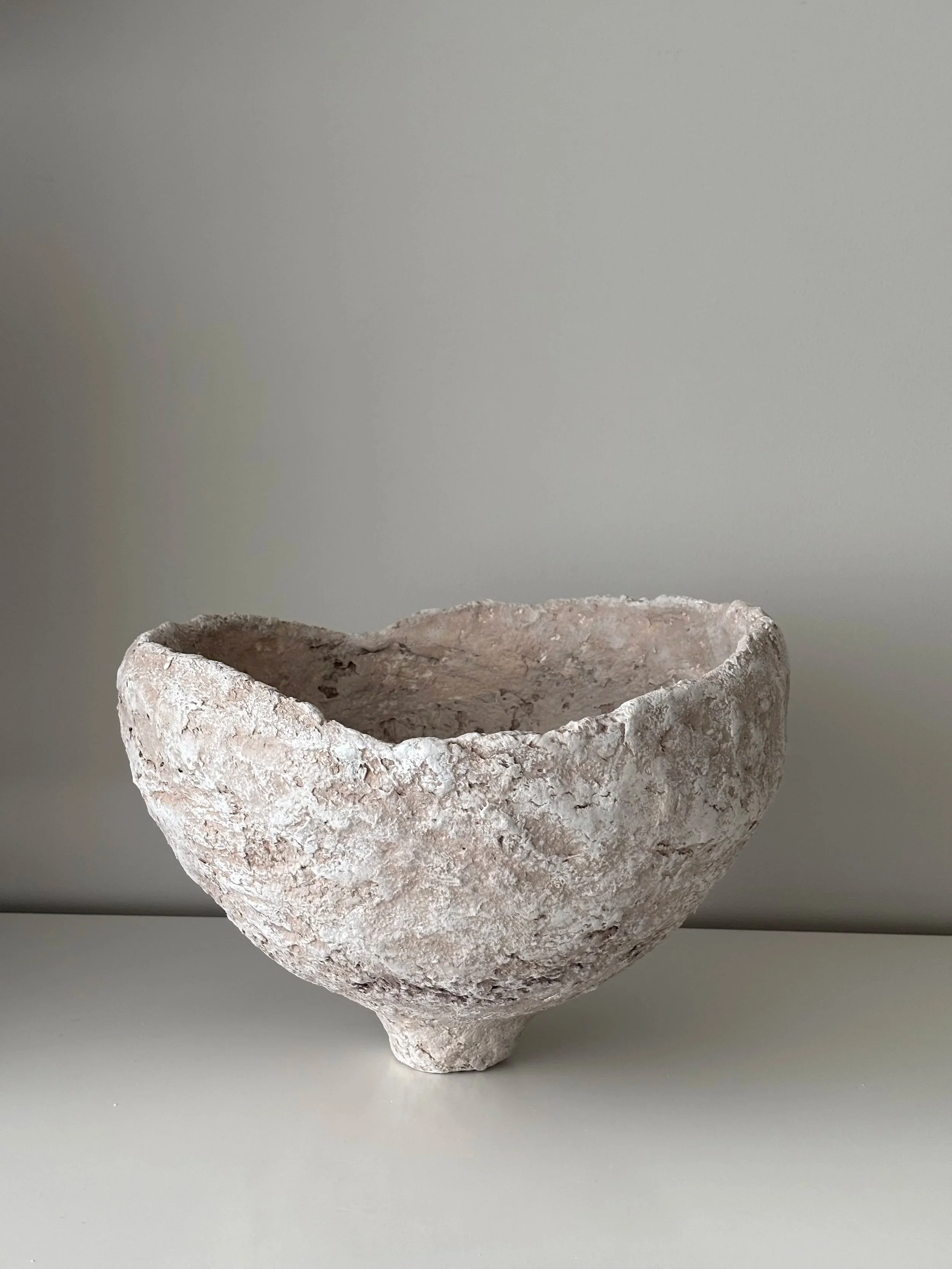 Close-up detail of Asymmetric Wabi Sabi Bowl N.9 surface texture, showing sculptural paper clay imperfections and Wabi-Sabi character