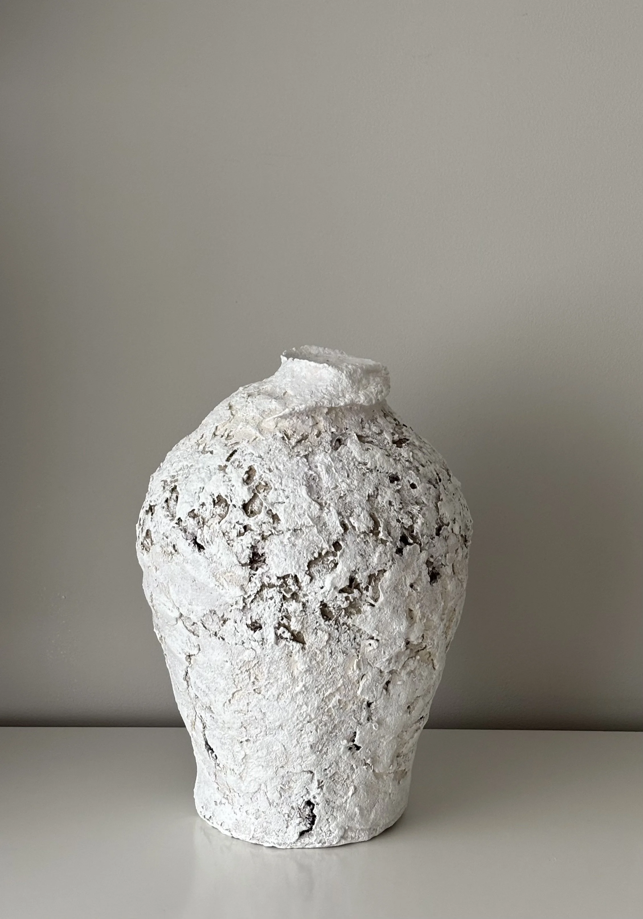 Close-up detail of Textured Vessel N.22 surface texture, showing sculptural paper clay imperfections and Wabi-Sabi character, unique handcrafted pottery