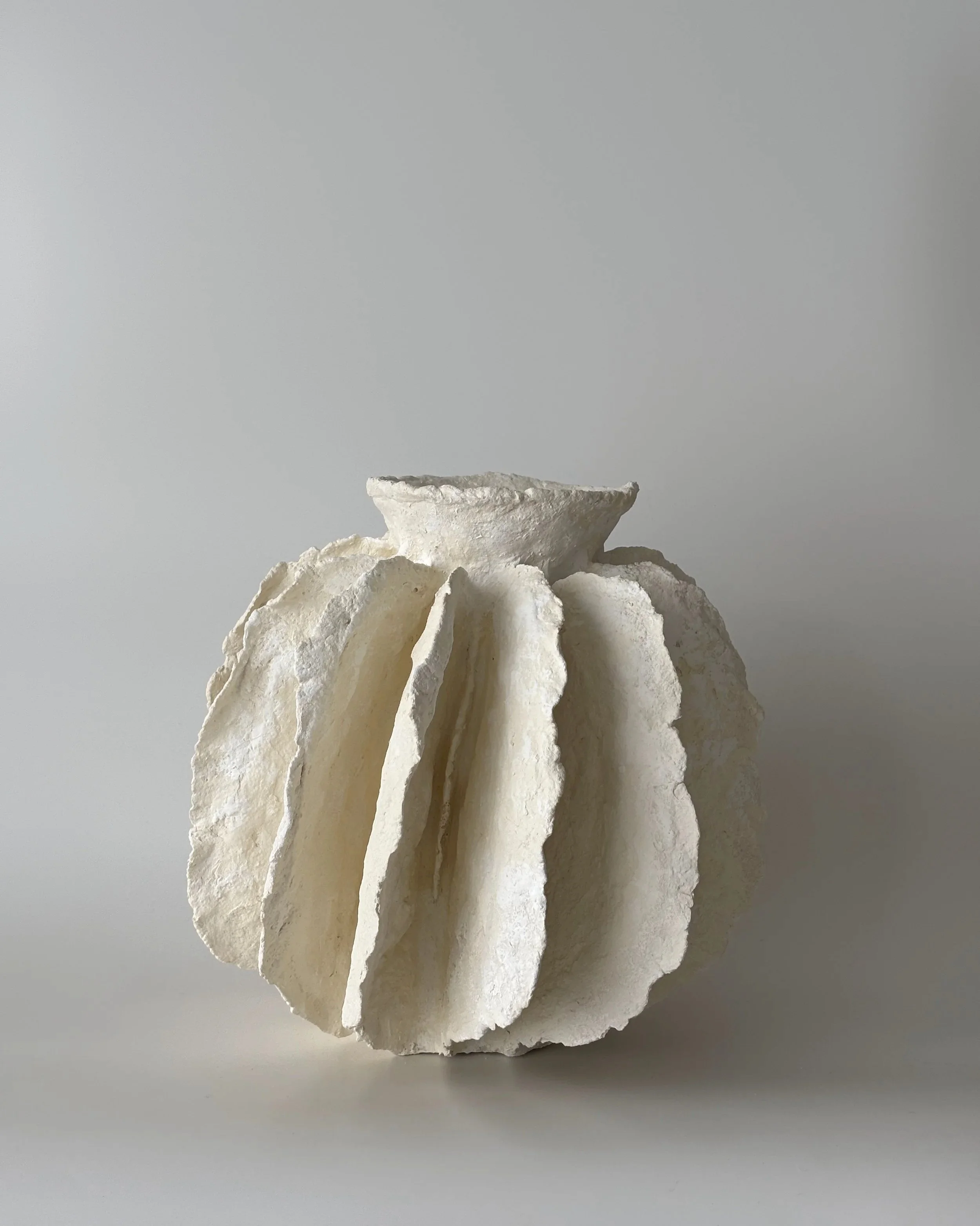 Pleated Vessel N.43, handmade paper clay vessel, front view. Papier Atelier London