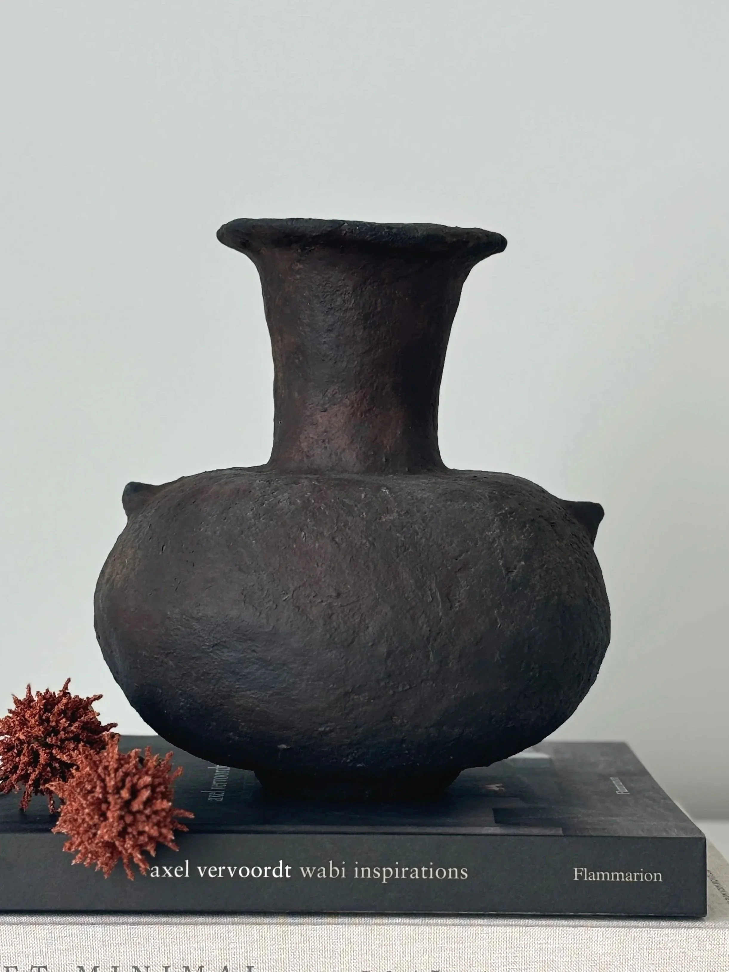 Side profile of Sculptural Vase N.18 in Wabi-Sabi inspired paper clay, showing the sculptural silhouette and textured surface, London atelier