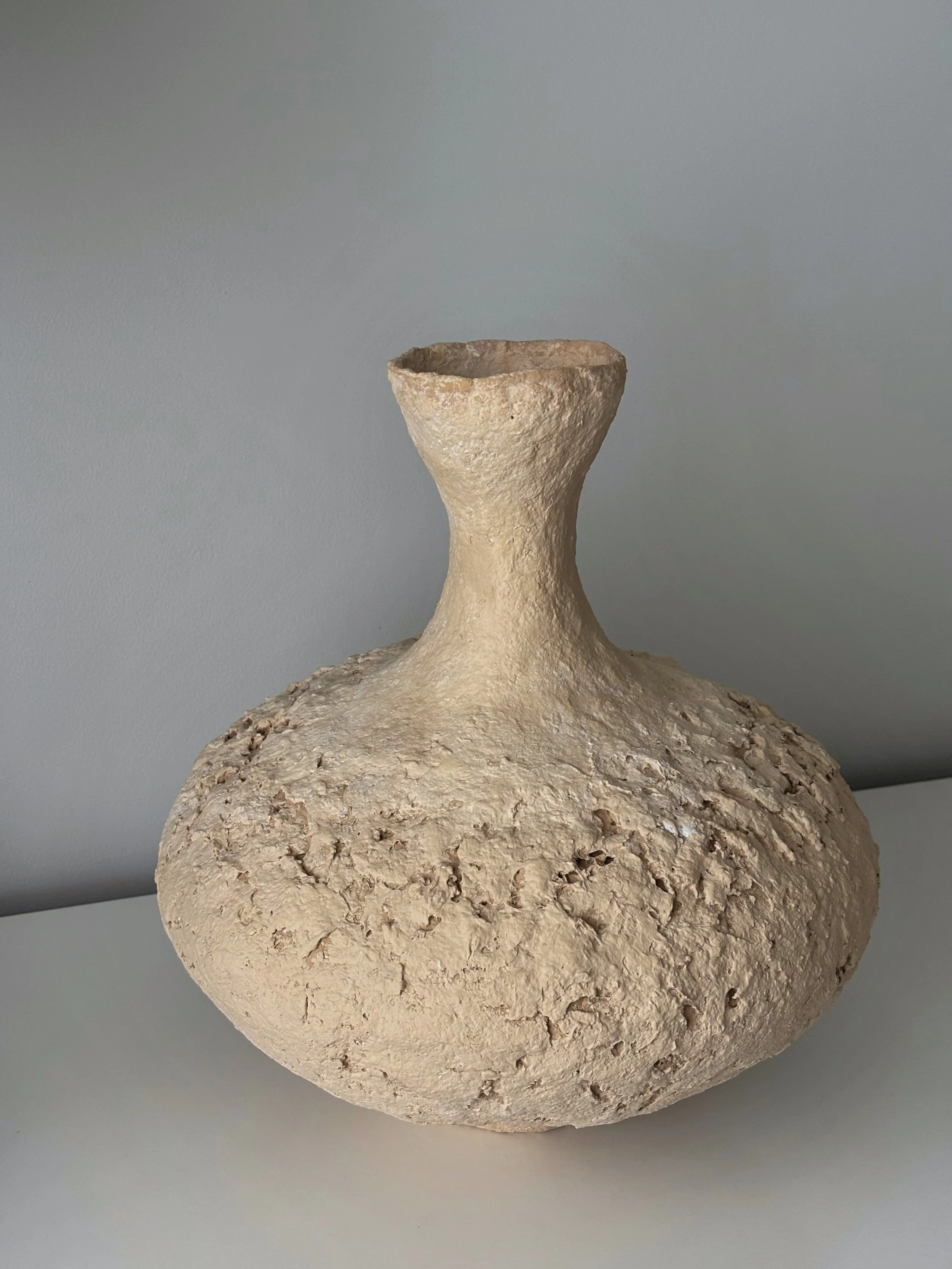Side profile of Wabi Sabi Vase N.6 in textured paper clay, showing the sculptural silhouette and textured surface, minimalist sculptural home decor