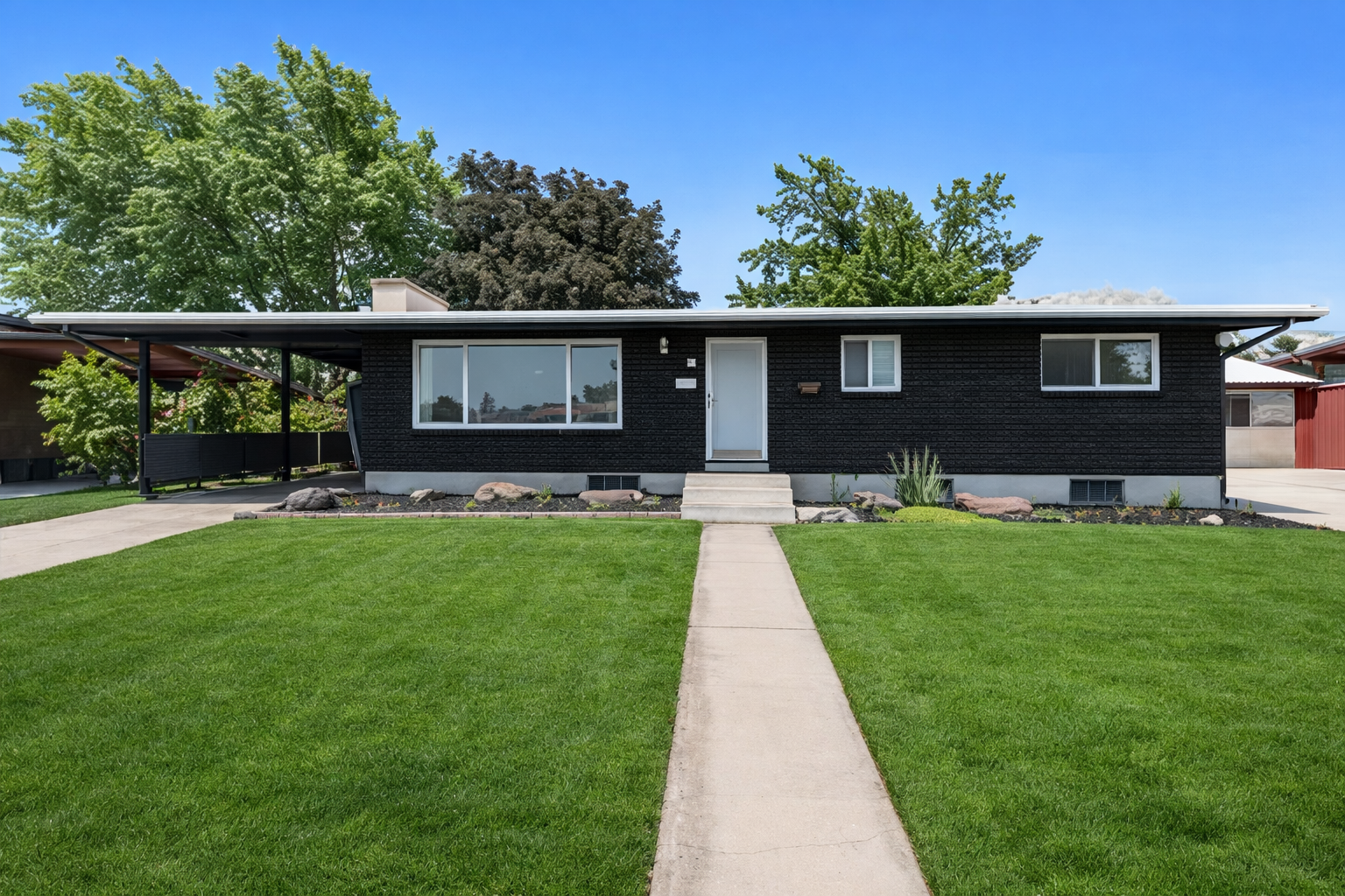 Pleasant Grove lawn mowing and lawn care in action at a home near PG High school
