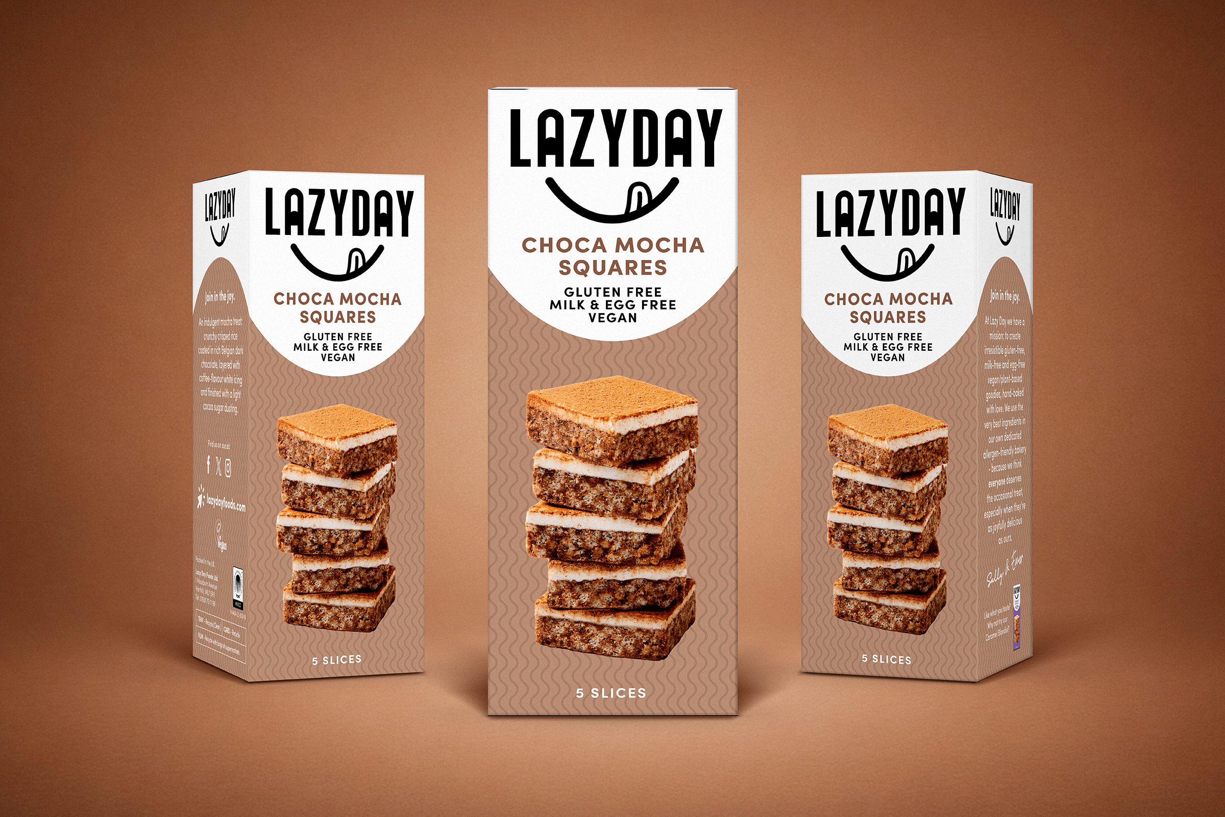 Three boxes of LazyDay Choca Mocha Squares with gluten free, dairy free, vegan label, featuring images of stacked chocolate squares on a brown background.