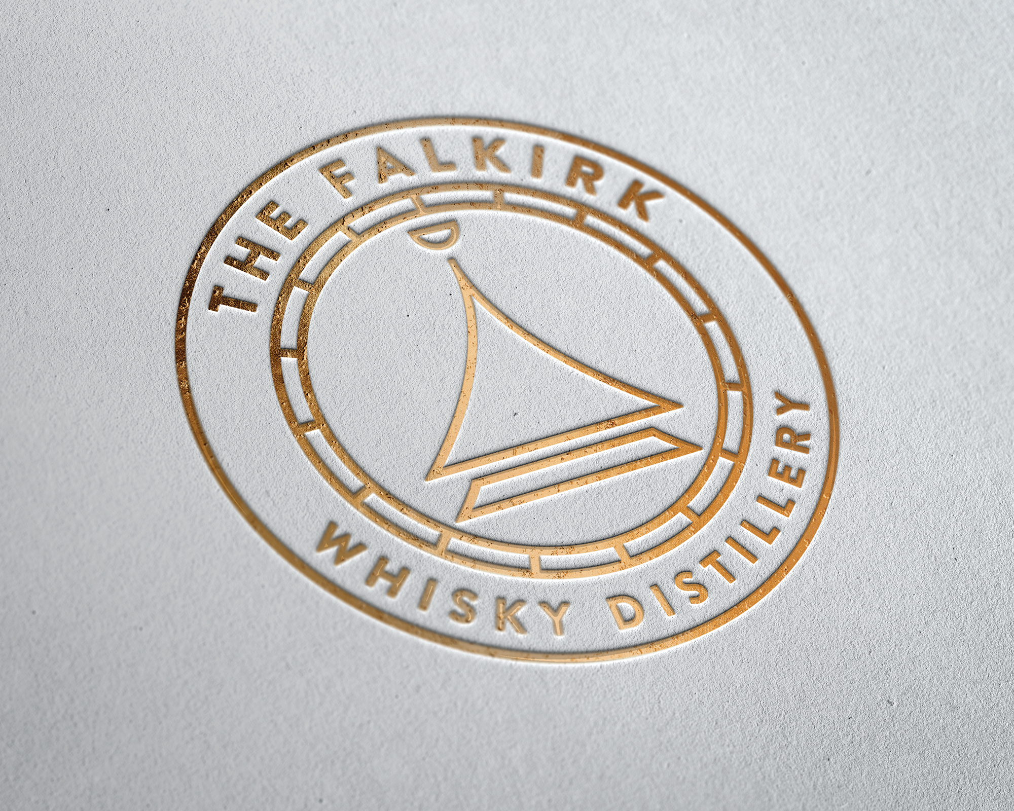 A circular logo with gold outline on a white surface, featuring a stylized boat and the text 'The Falkirk Whisky Distillery' around the edge.