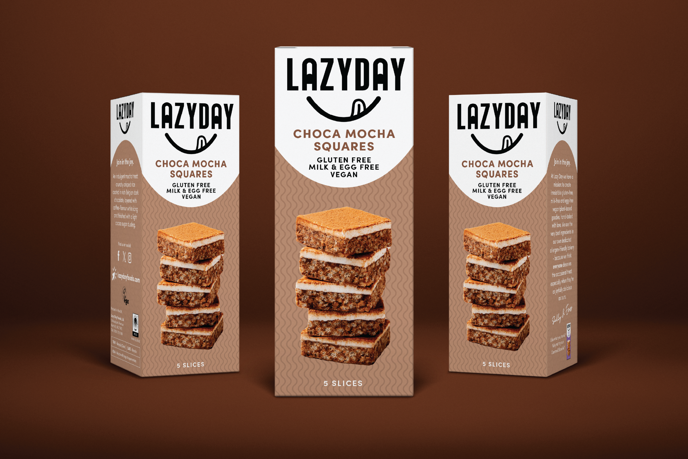 Three boxes of Lazyday Choca Mocha Squares with stacked biscuity dessert wafers, set against a brown background