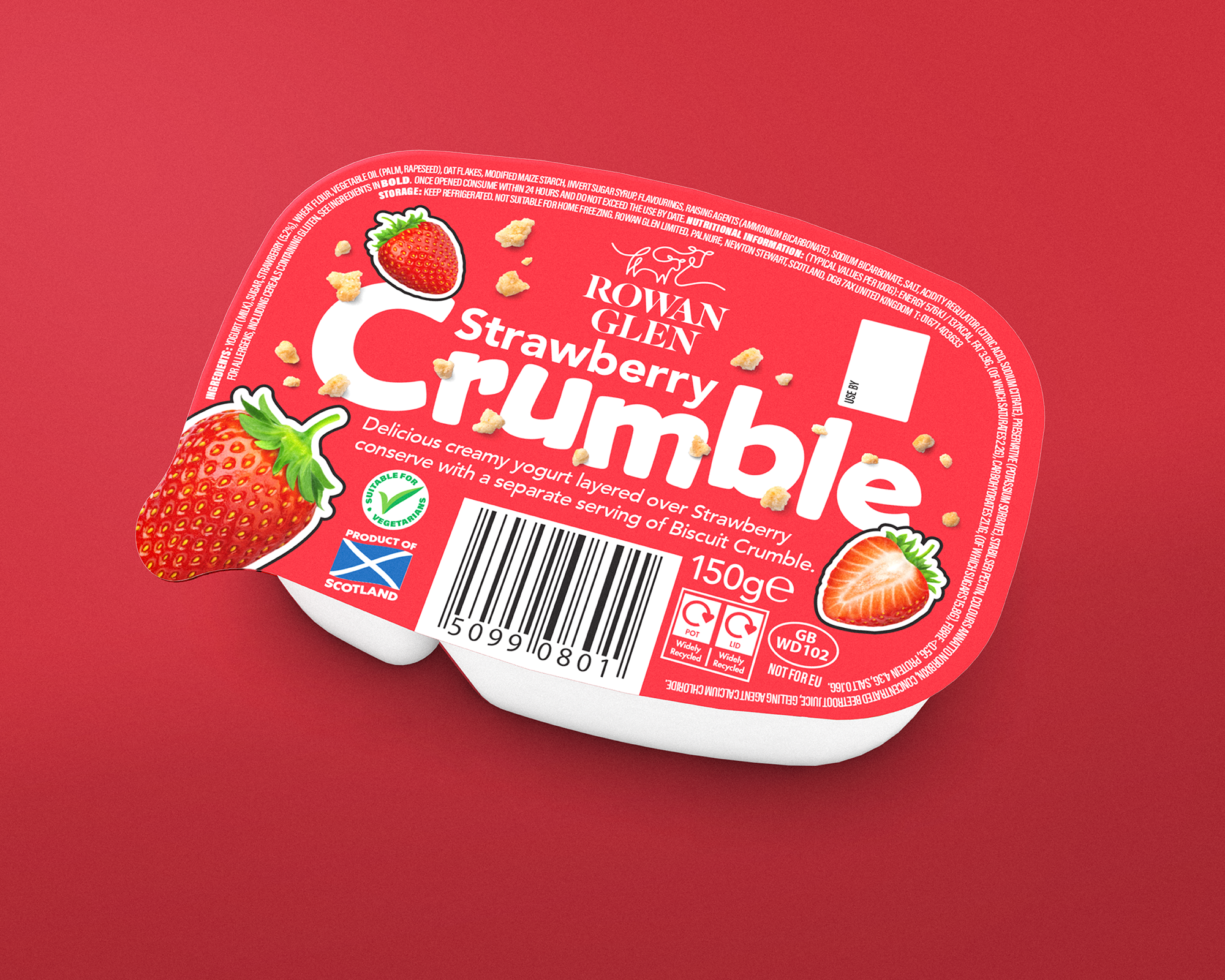 A container of Rowan Glen Strawberry Crumble dessert with a label showing strawberries and crumble topping, on a red background.