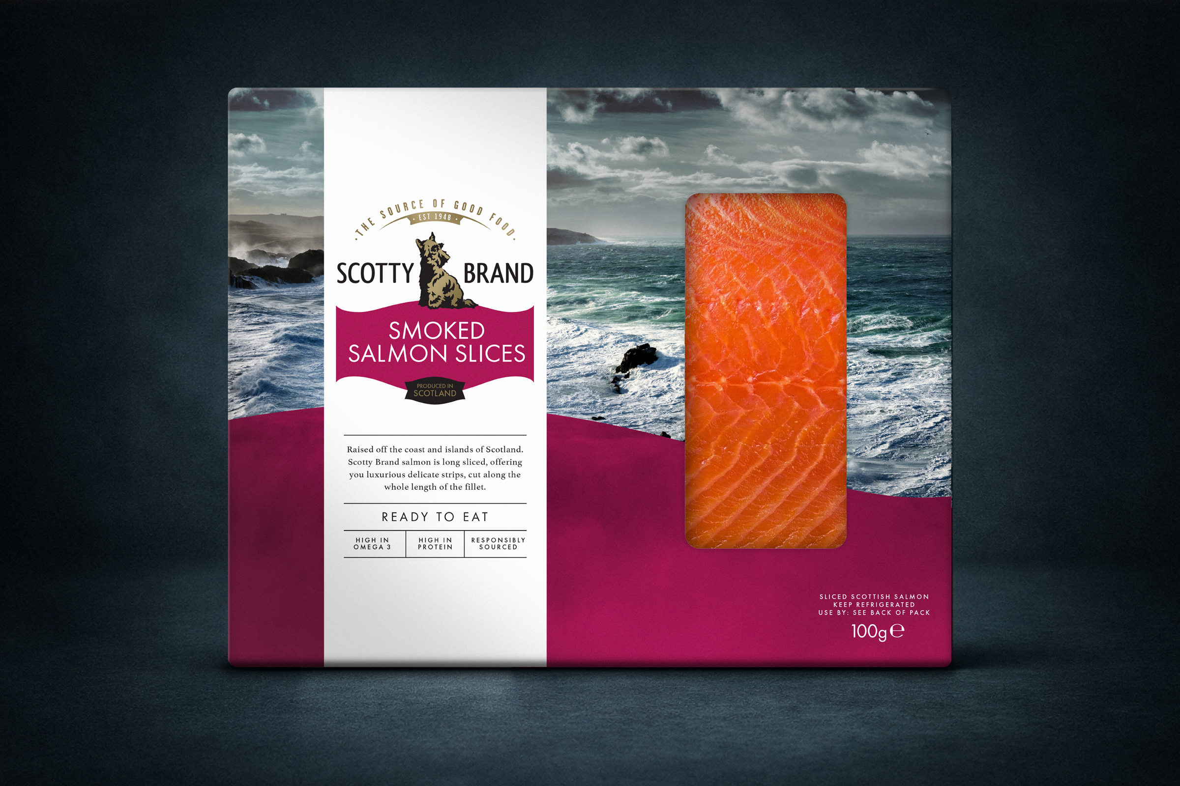 Pkg of Scotty Brand smoked salmon slices with a window showing the salmon and a beach scene in the background.