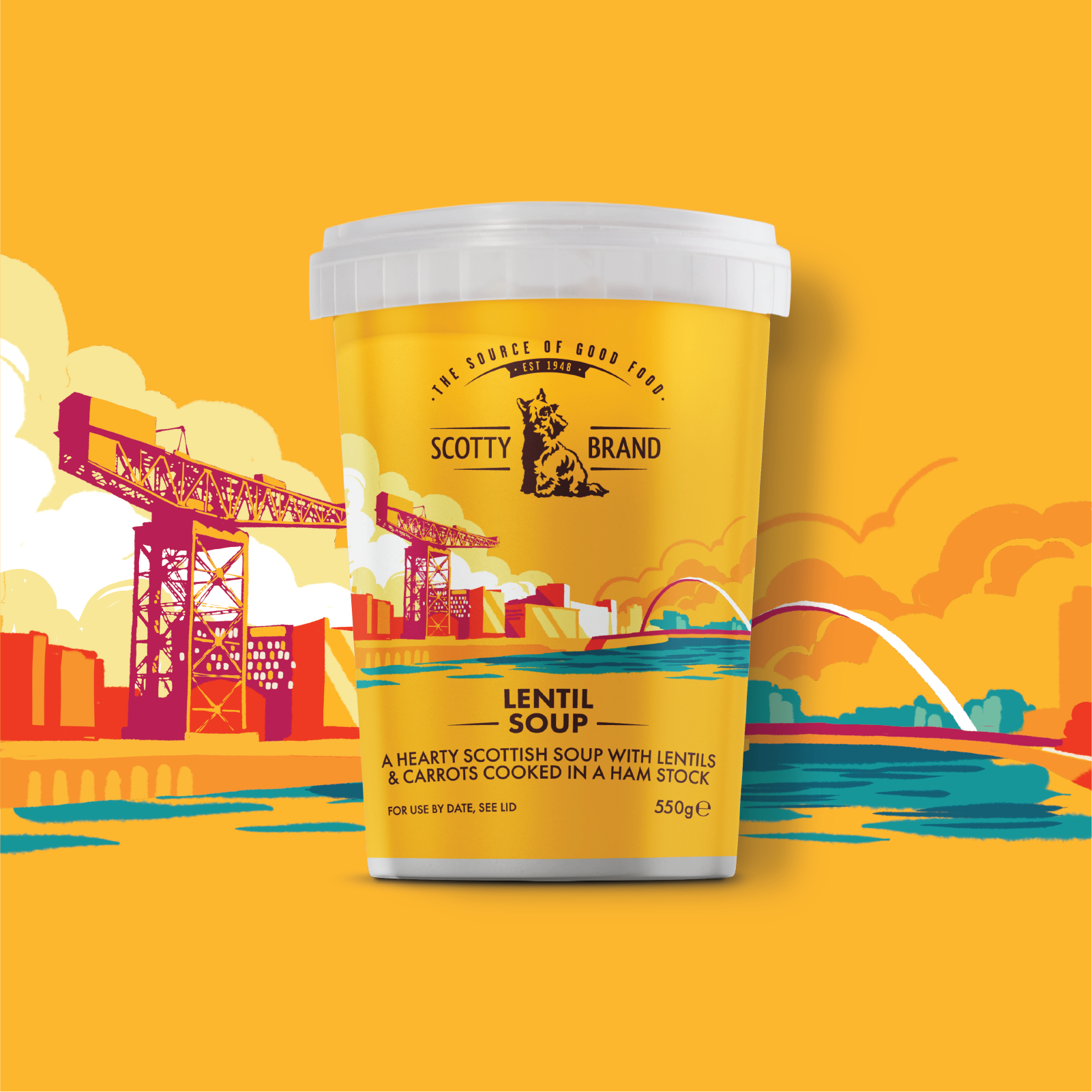 A bright yellow container of Scotty Brand Lentil Soup with a cityscape featuring a bridge, buildings, and a water fountain in the background.