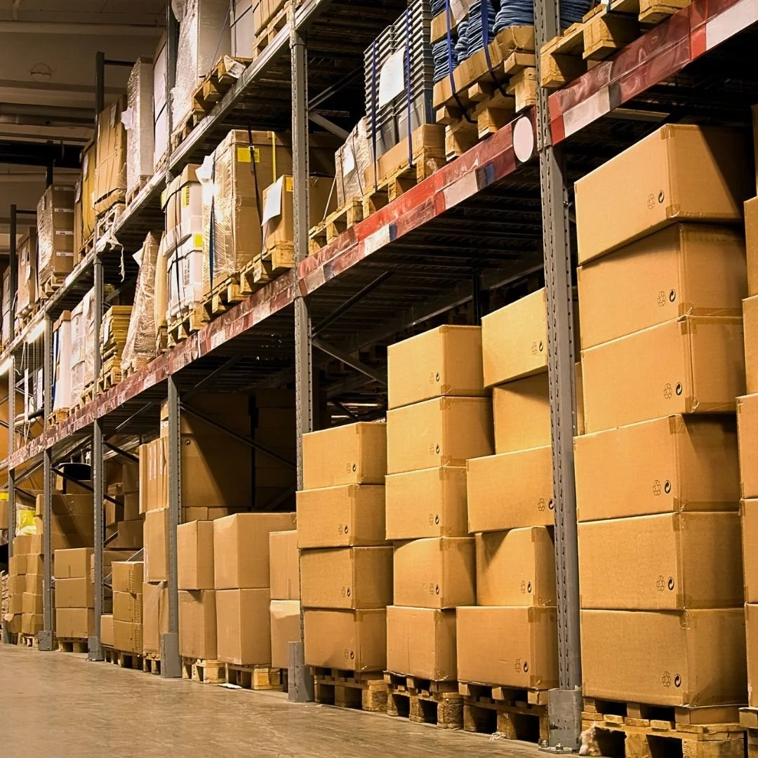 Warehouse shelf stocked with organized boxes and packages, showcasing efficient storage, inventory management, and streamlined logistics for brands and wholesale distribution.