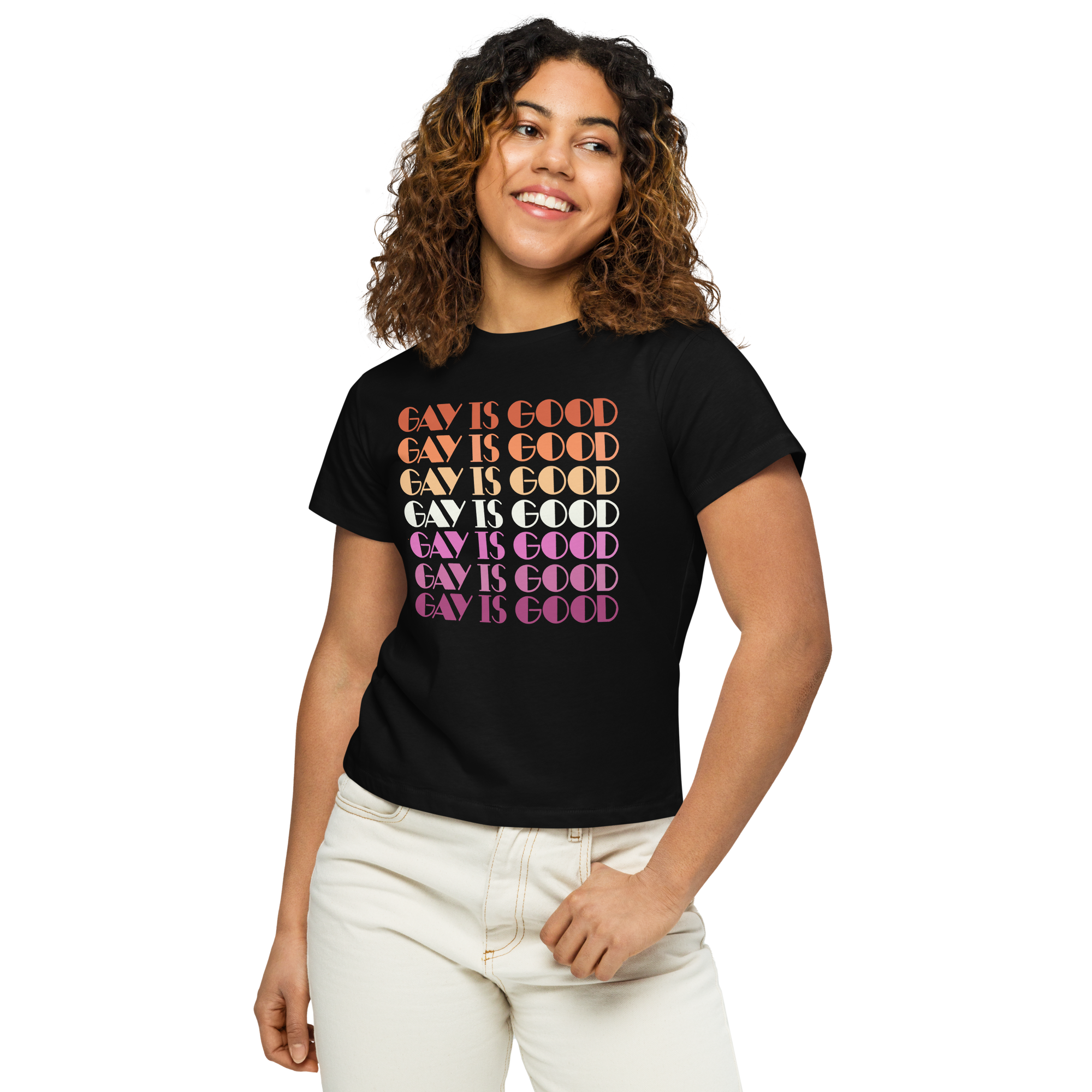 Detail of Gay Is Good lesbian pride graphic in pink, orange, and white colorway on women's tee