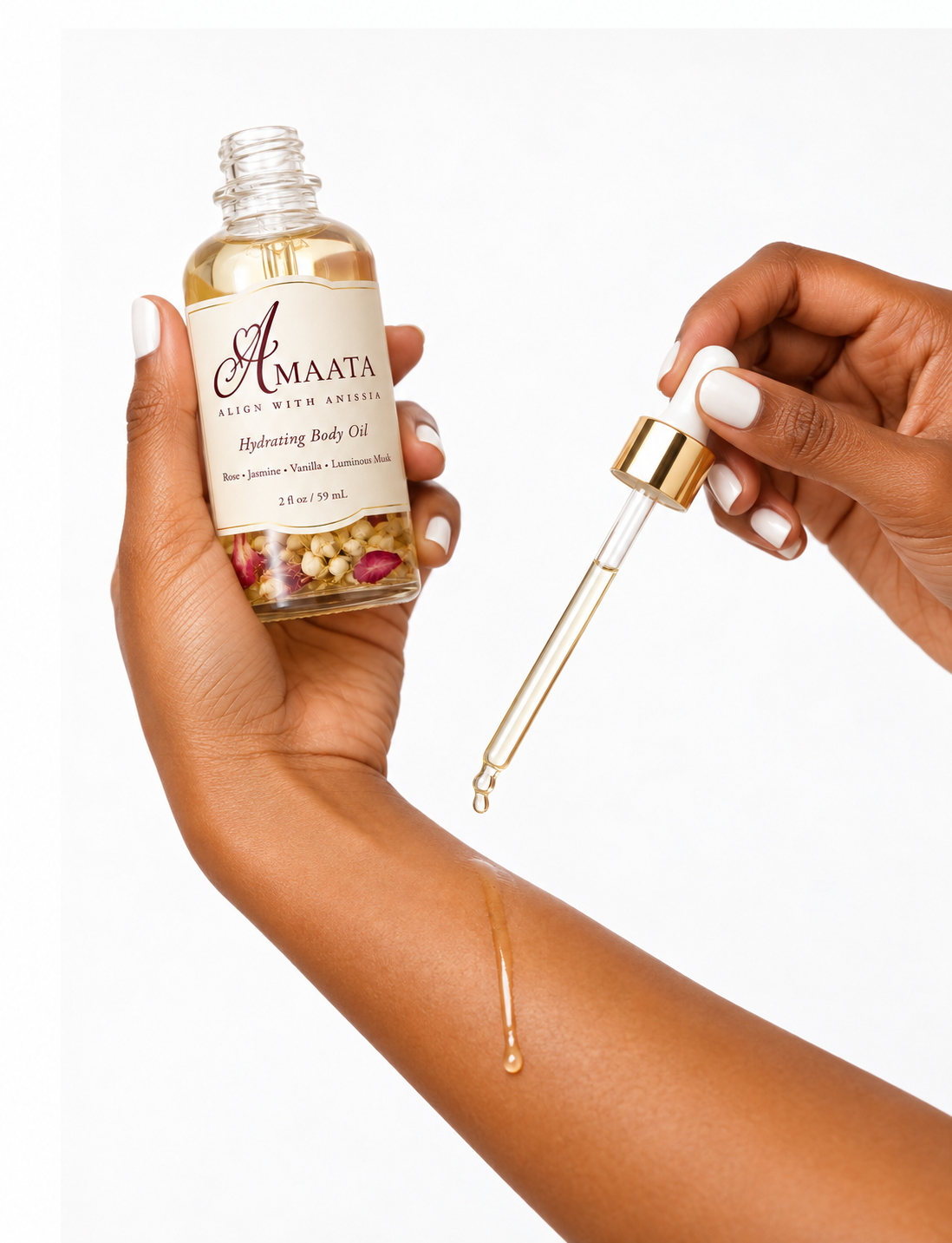 AMAATA Hydrating Body Oil by Align With Anissia applied to the skin with a glass dropper for an intentional moisturizing body care ritual.