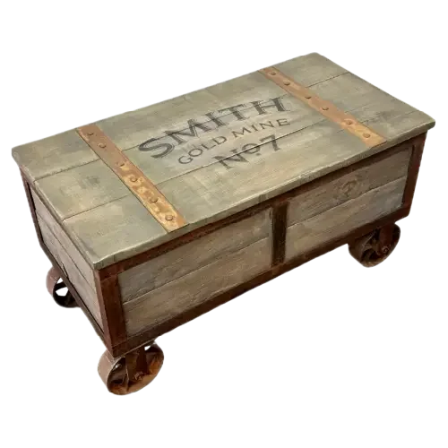 Vintage wooden cart with wheels, labeled 'SMITH GOLD MINE LAY' in black text on the top.