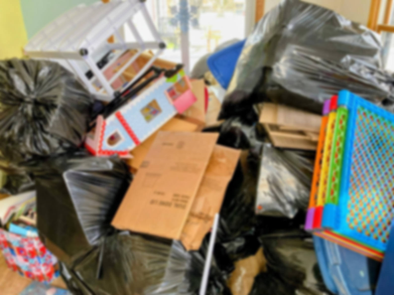 Room cleanout with bags and boxes