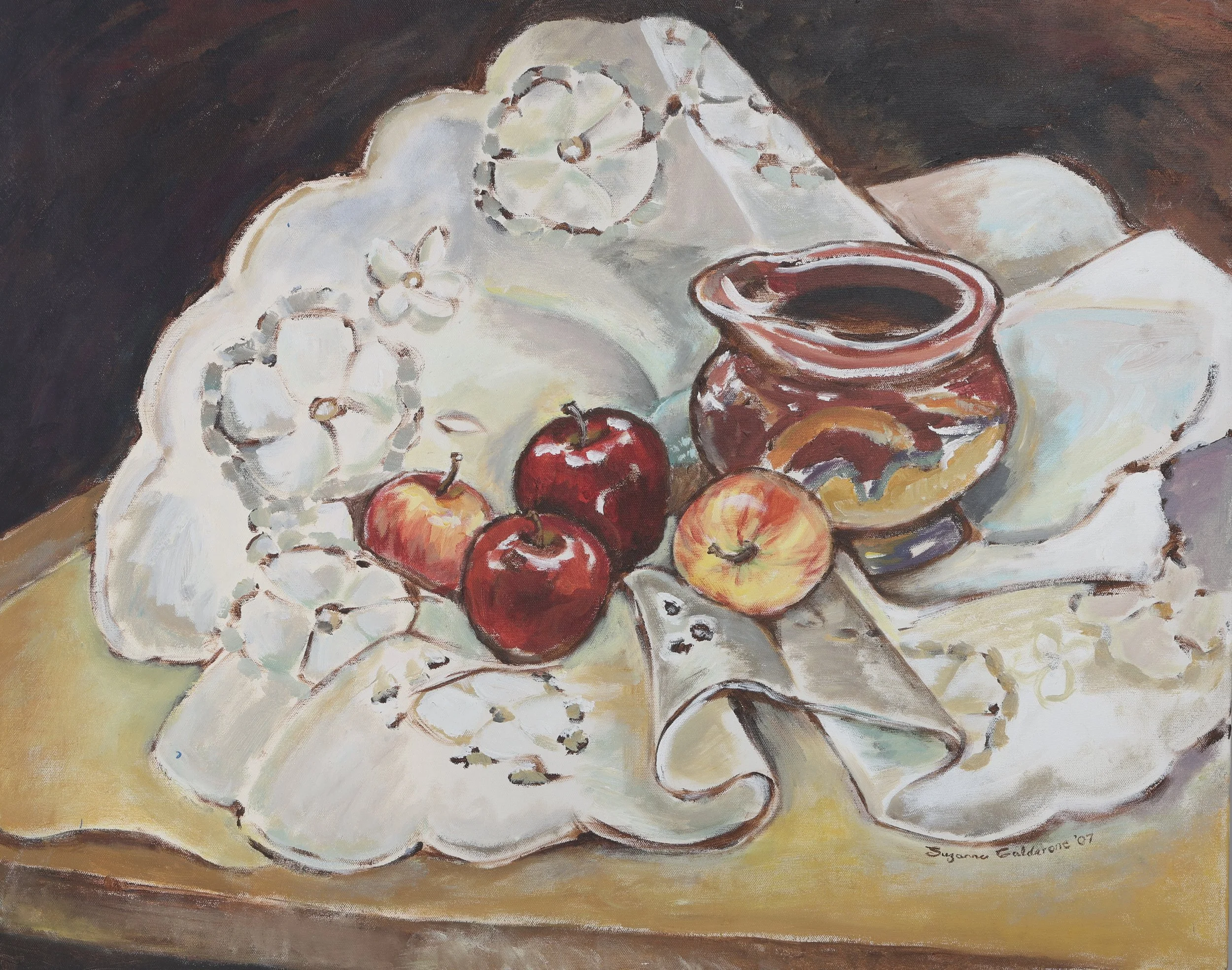 A still life painting showing a clay pot, four red and yellow apples, and a white cloth with floral embroidery,
