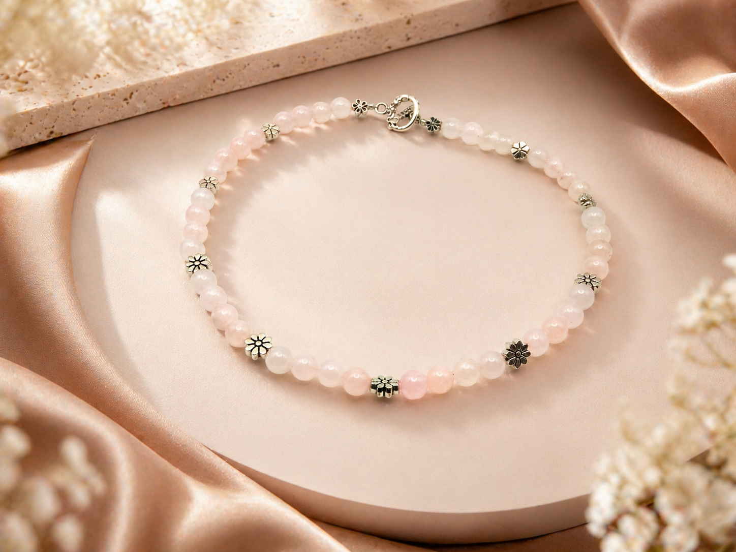 Rose Quartz with flower spacer.png