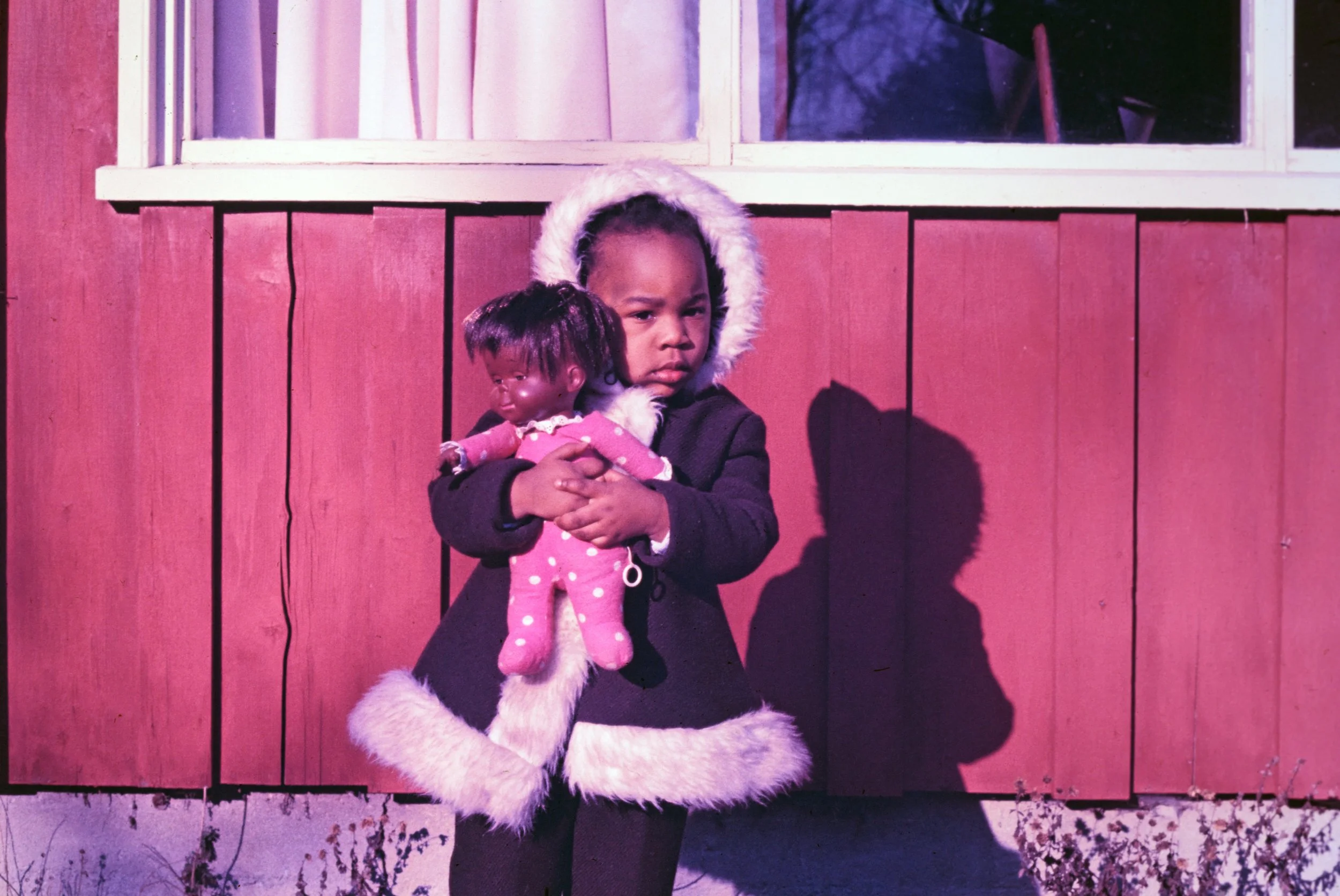 Clutching a Black doll.jpg