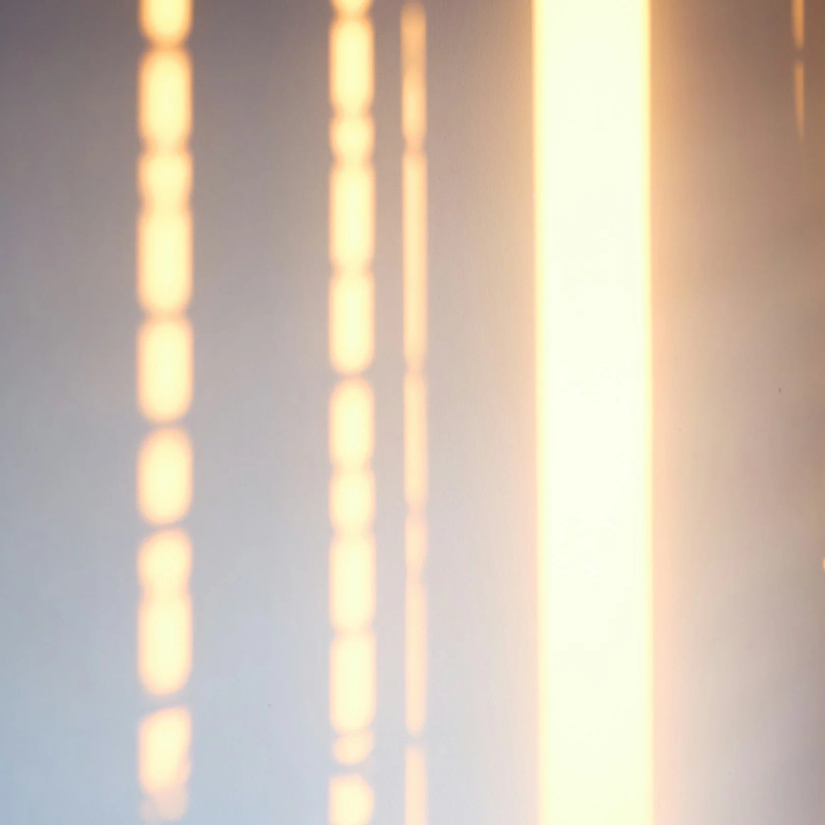 Sunlight reflection on white wall