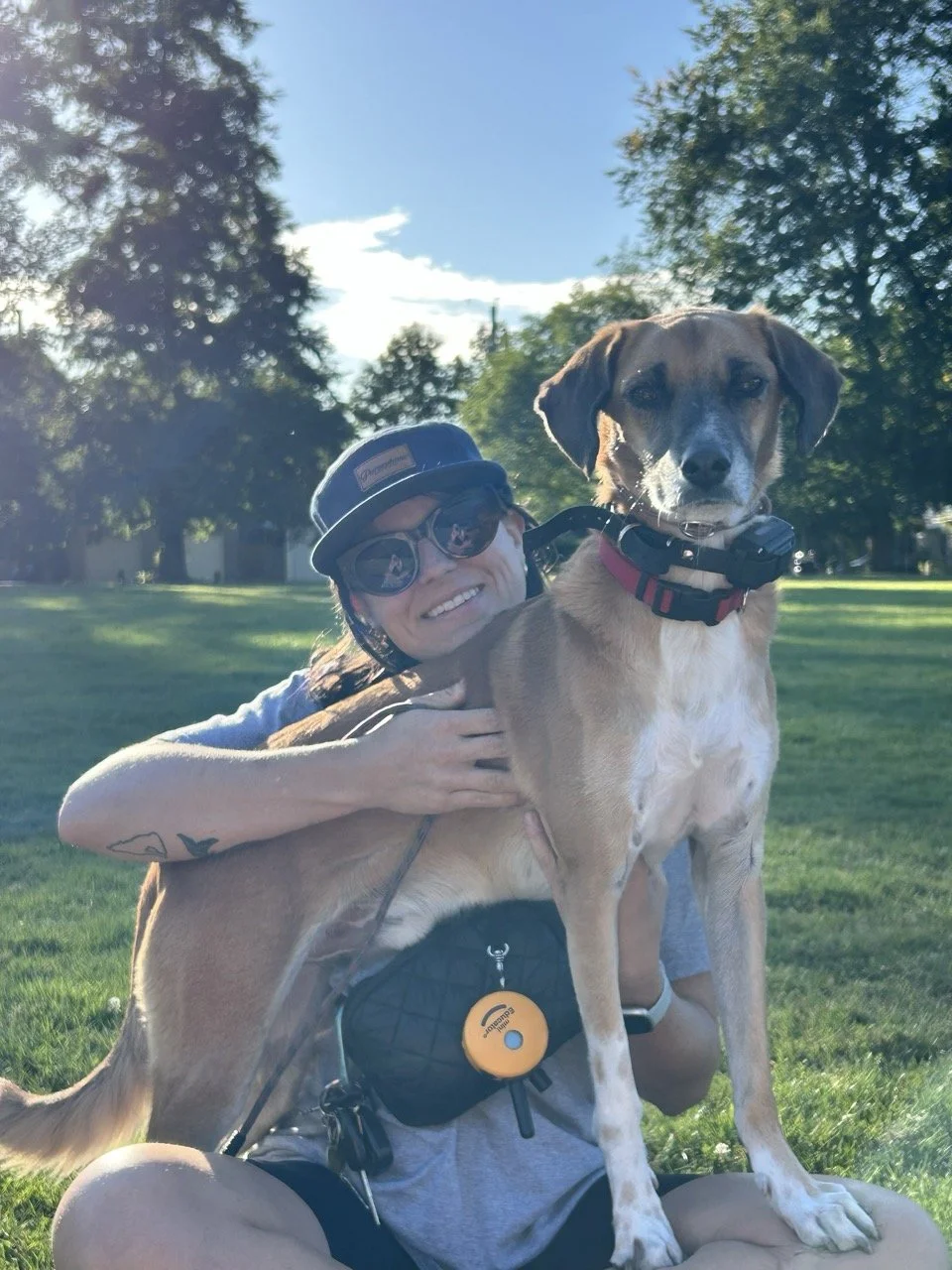 Jane Rea therapist in Vancouver at Oddly Human Counselling posing with her rescue dog.