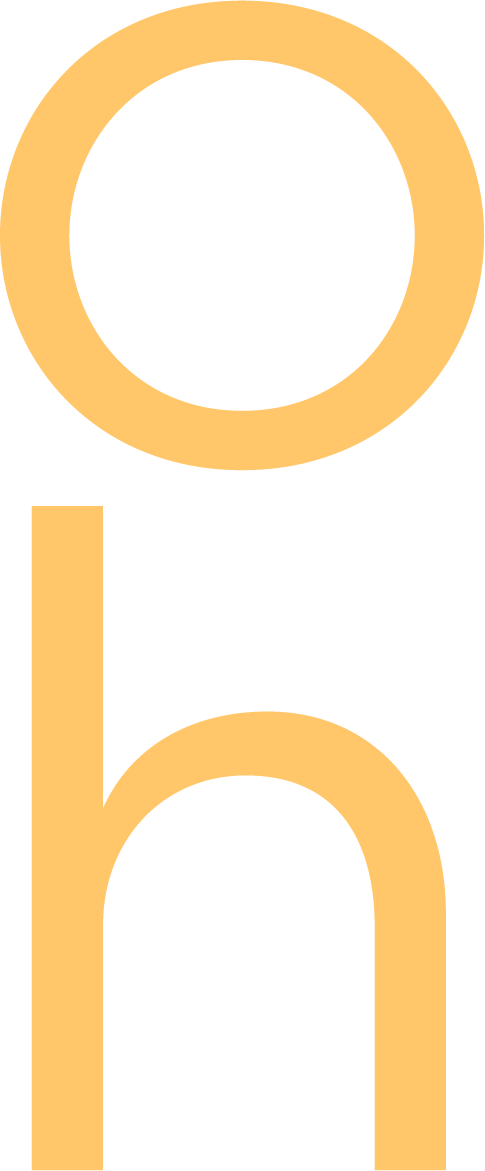 A large stylized letter 'h' with a circular top, depicted in a light orange color.